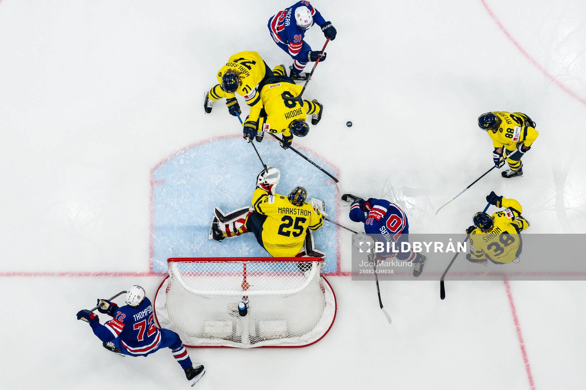 Tage Thompson, Frank Nazar and Matty Beniers of USA in