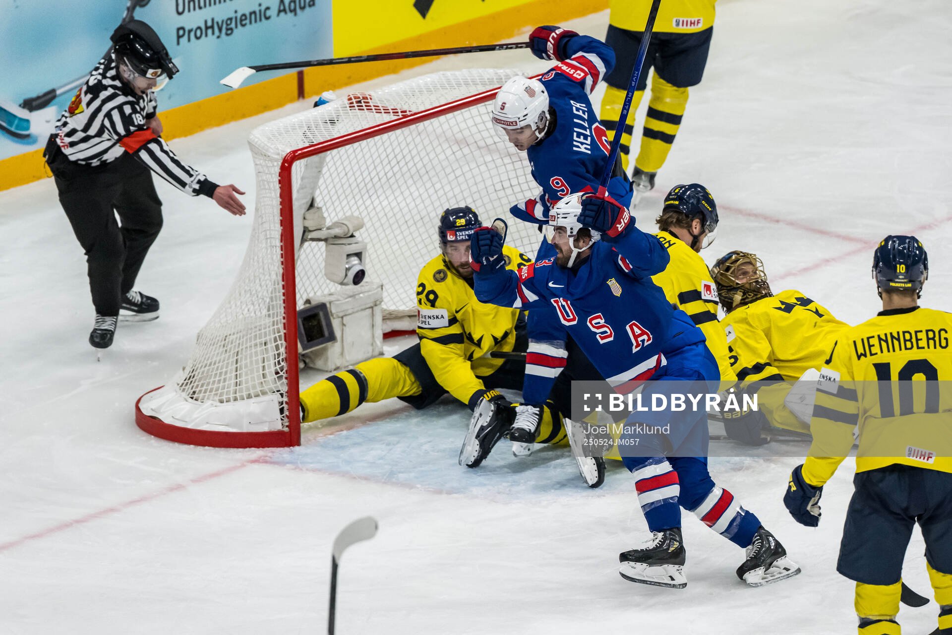 Clayton Keller and Conor Garland of USA celebrate