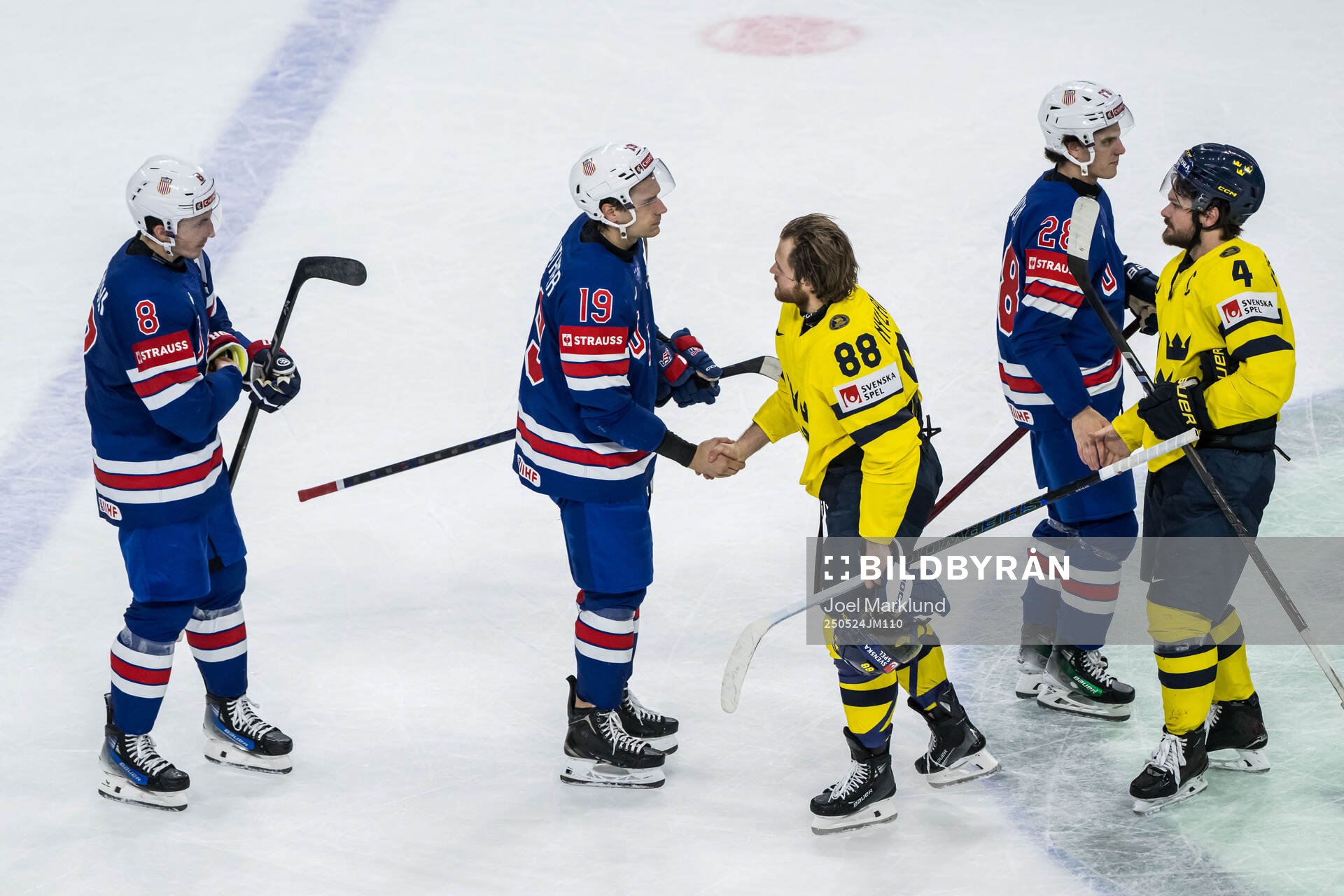 William Nylander and Rasmus Andersson of Sweden with Zach