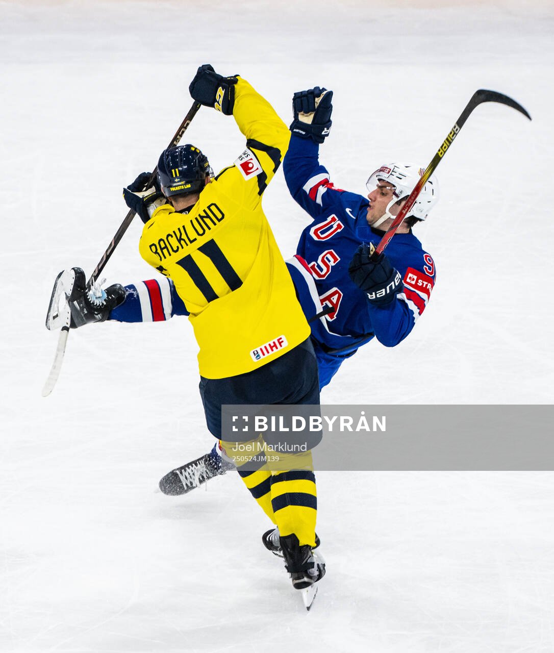 Mikael Backlund of Sweden tackles Frank Nazar of USA