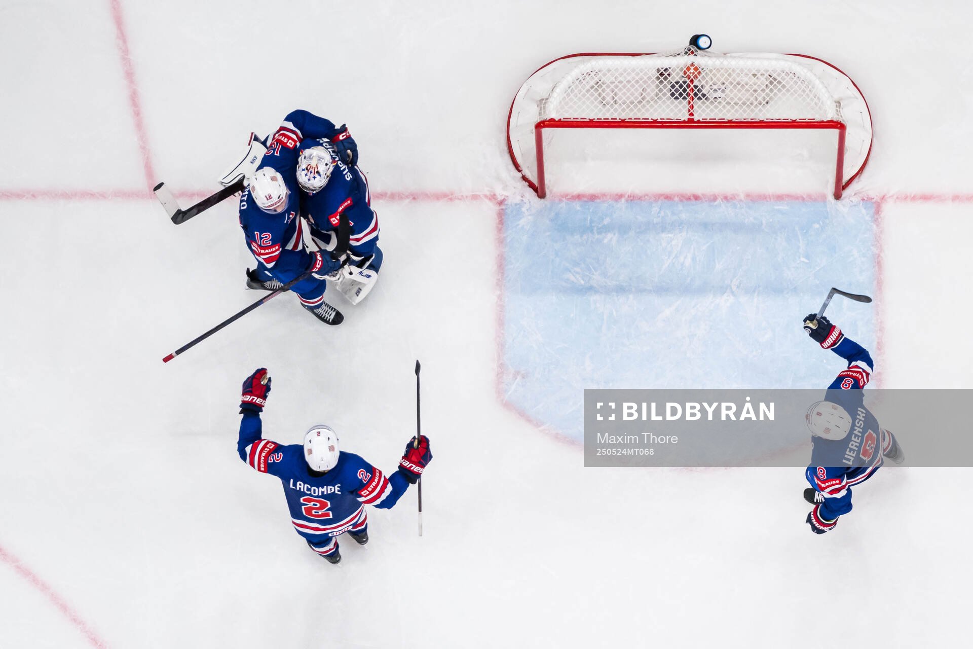 Shane Pinto, goaltender Jeremy Swayman, Jackson LaCombe and