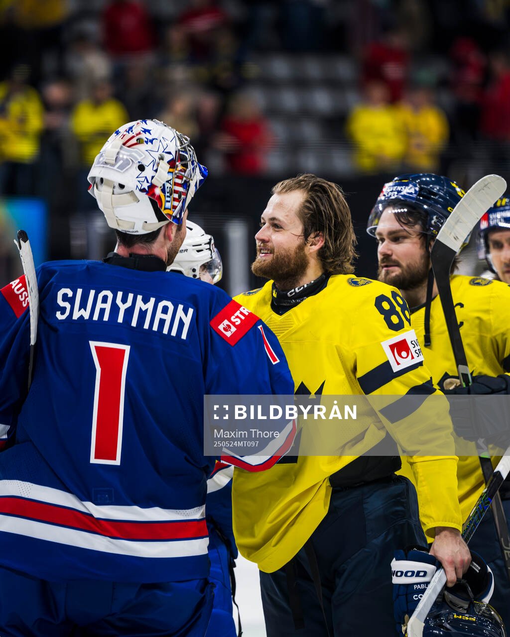 Goaltender Jeremy Swayman of USA and William Nylander of