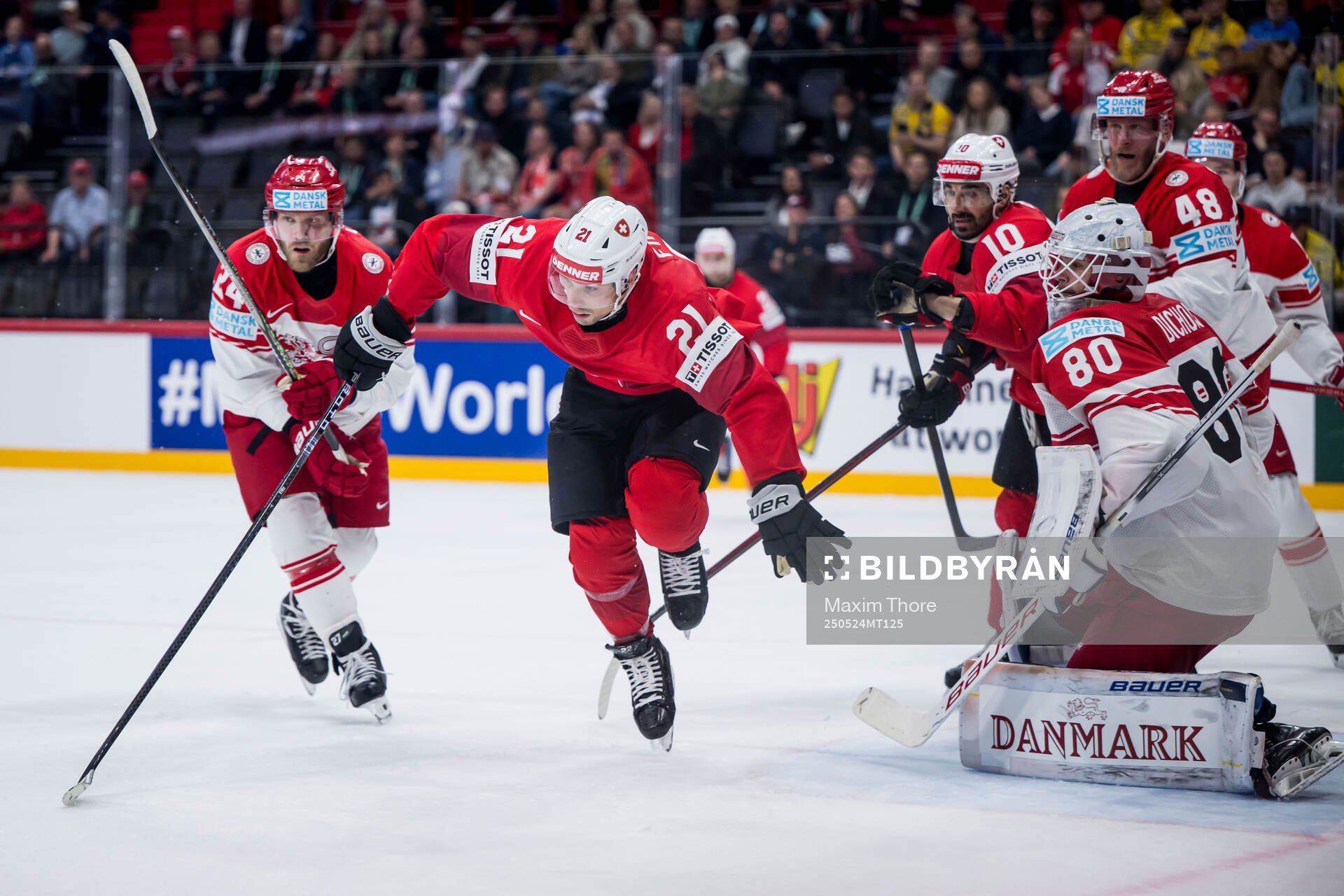 Kevin Fiala of Switzerland against Nikolaj Ehlers and