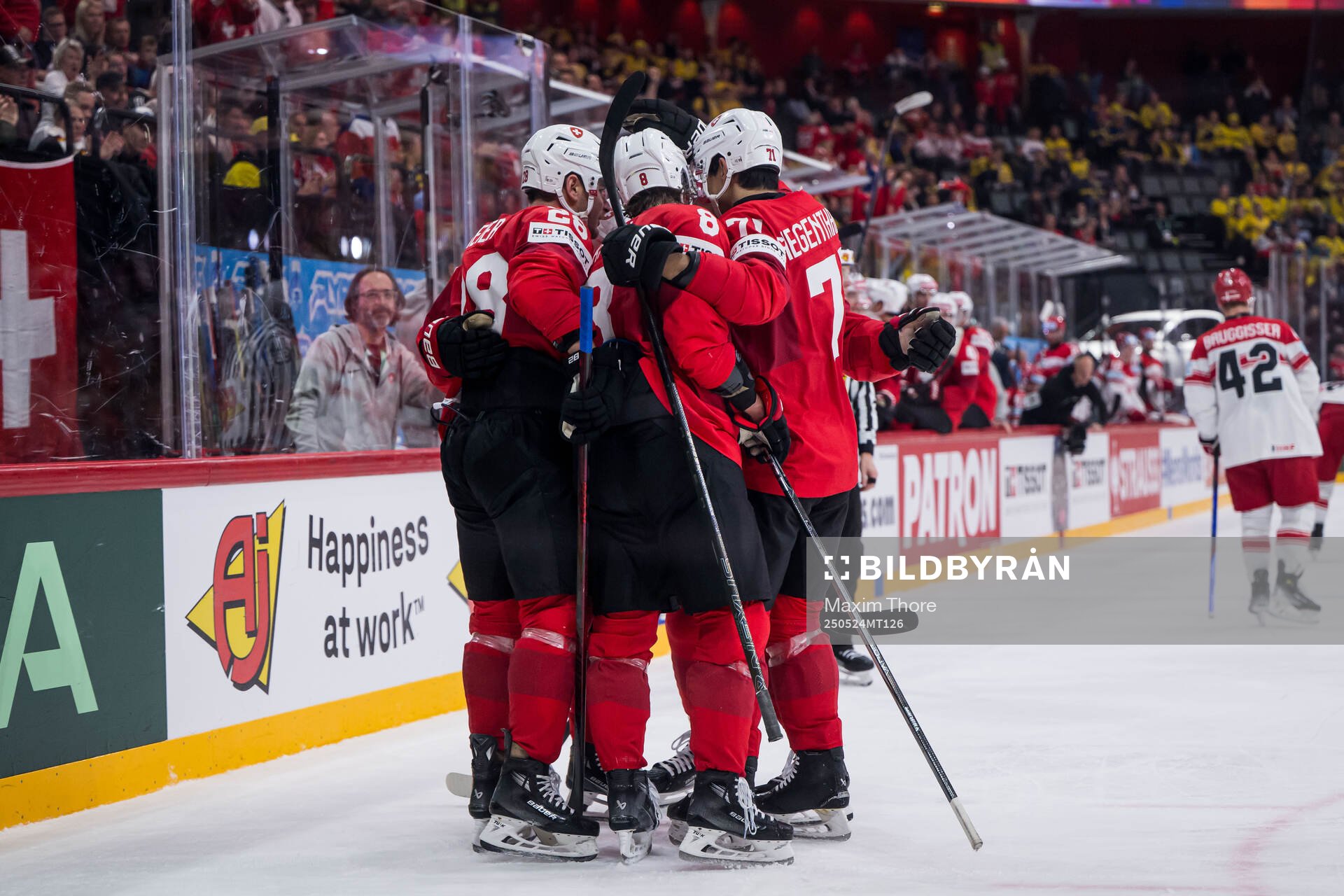 Timo Meier of Switzerland celebrates with teammates