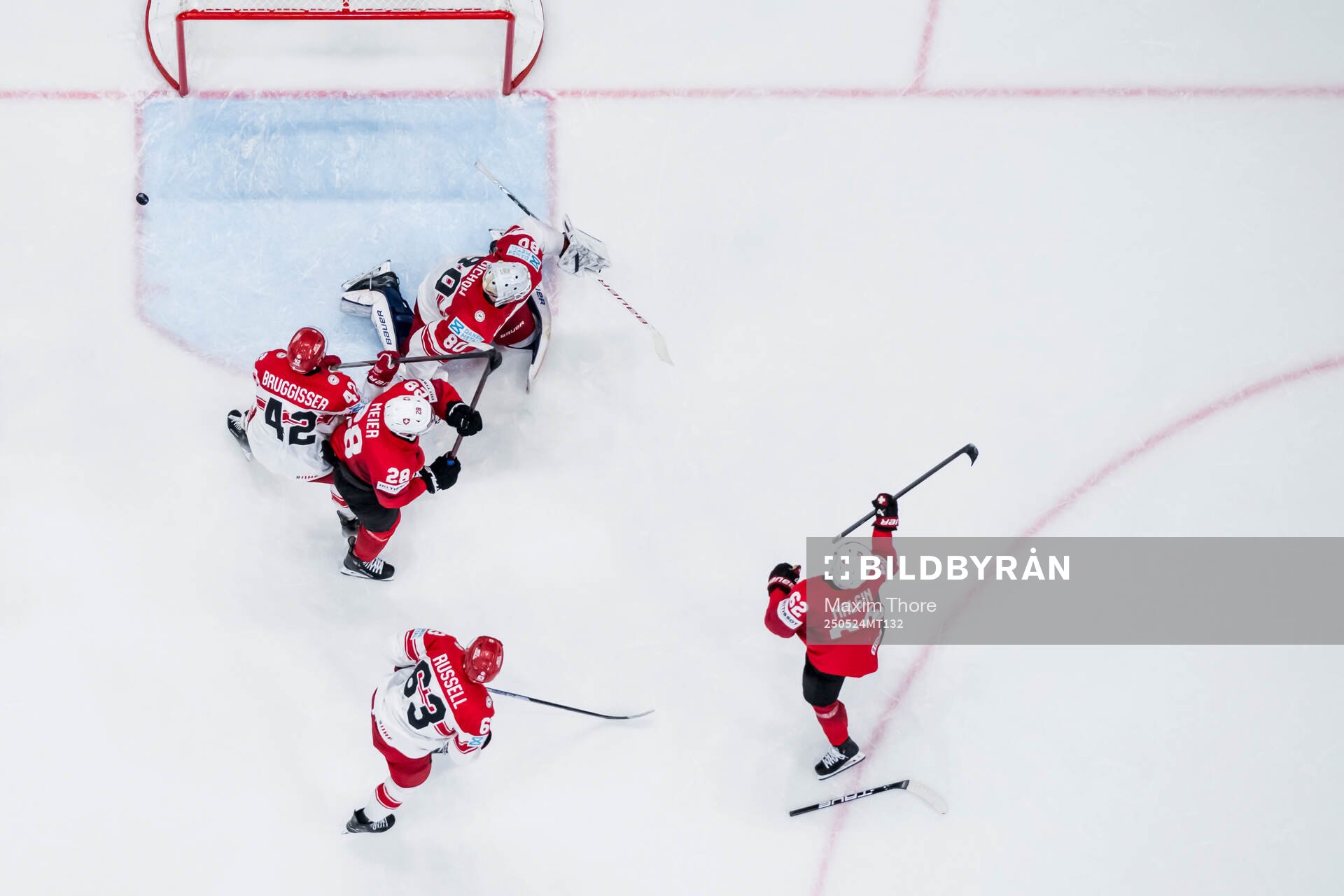 Denis Malgin of Switzerland celebrates