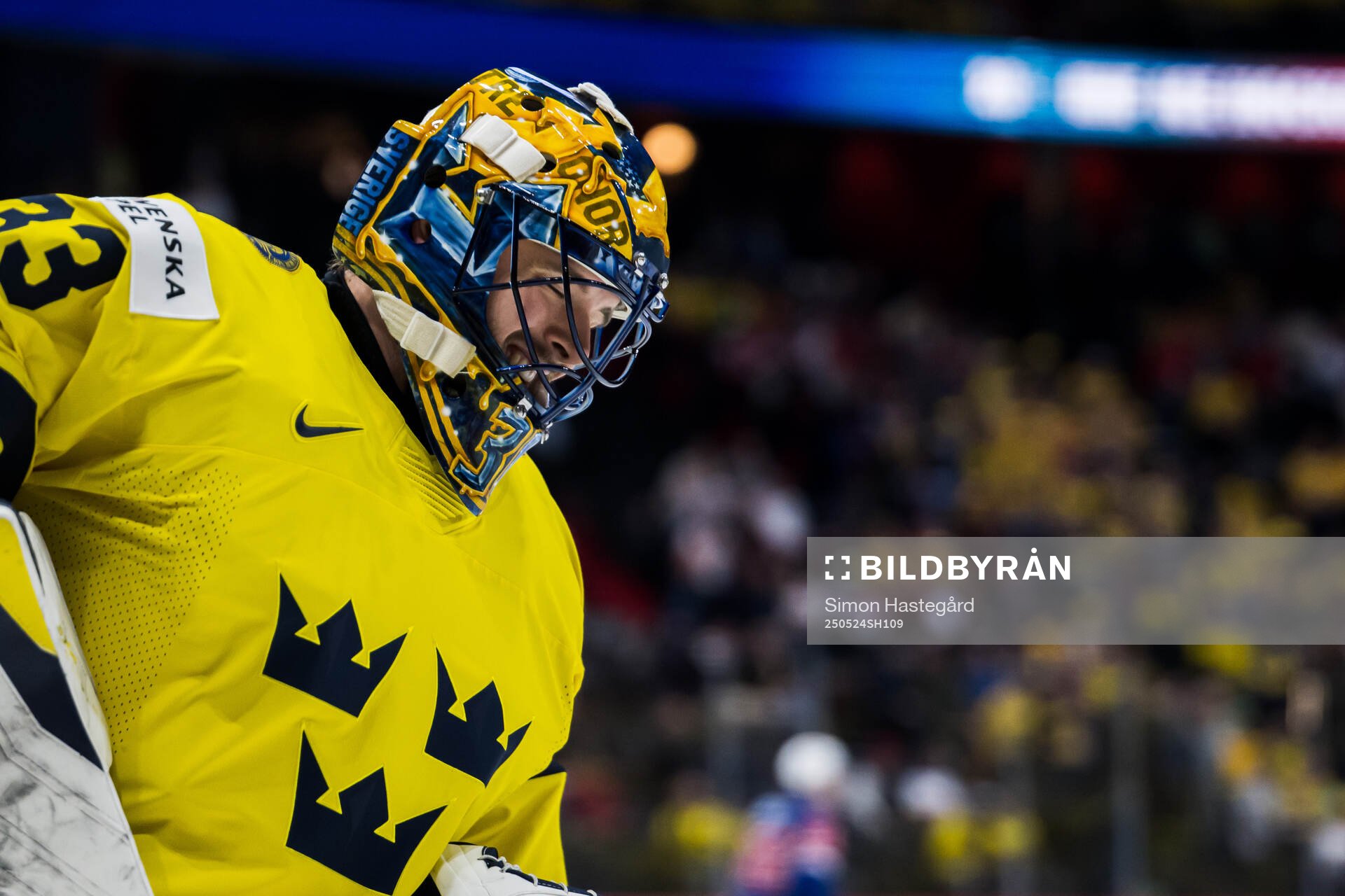Goaltender Samuel Ersson of Sweden looks dejected
