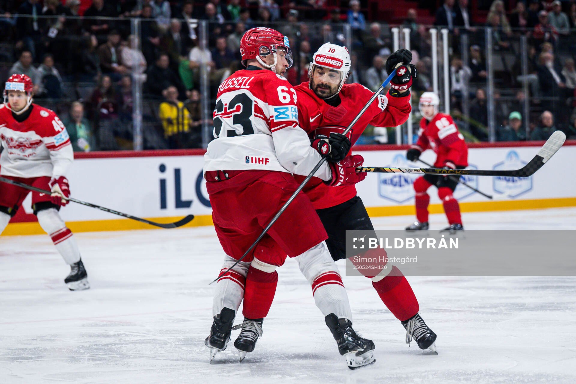 Patrick Russell of Denmark and Andres Ambuhl of Switzerland