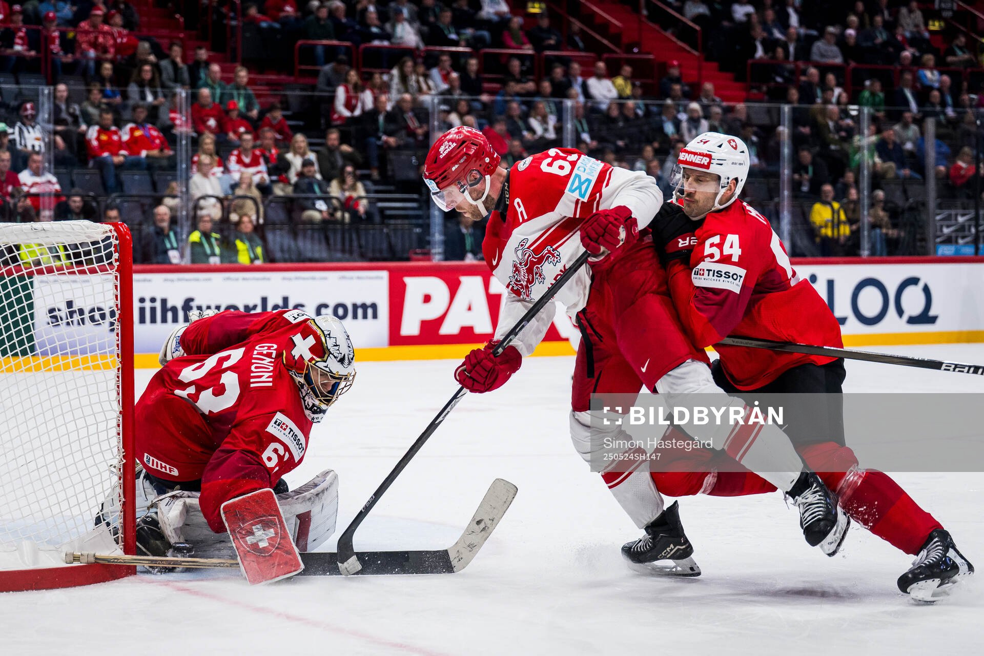 Patrick Russell of Denmark against goalkeeper Leonardo