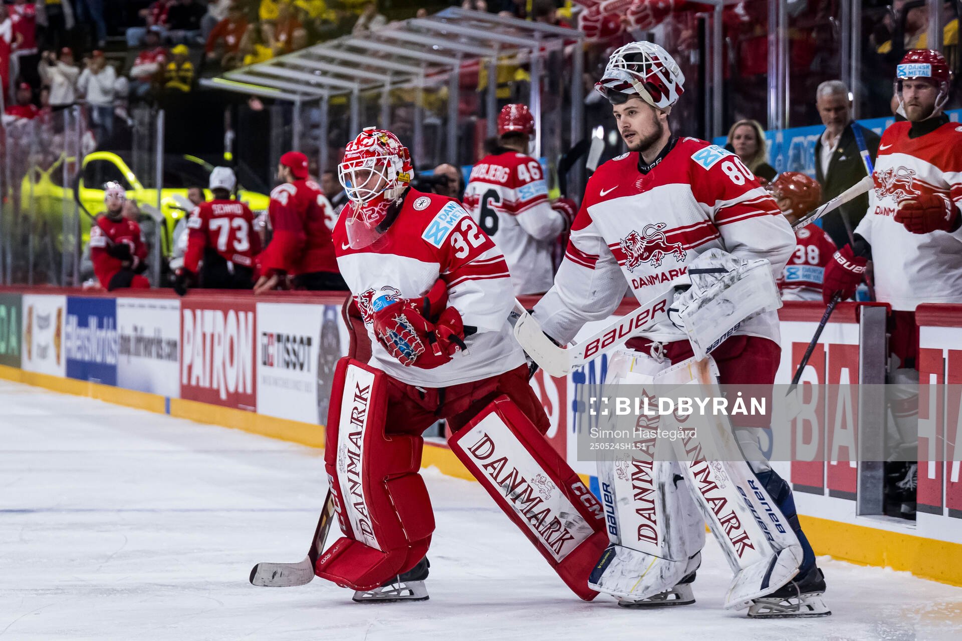 Goaltender Sebastian Dahm and goaltender Frederik Dichow of