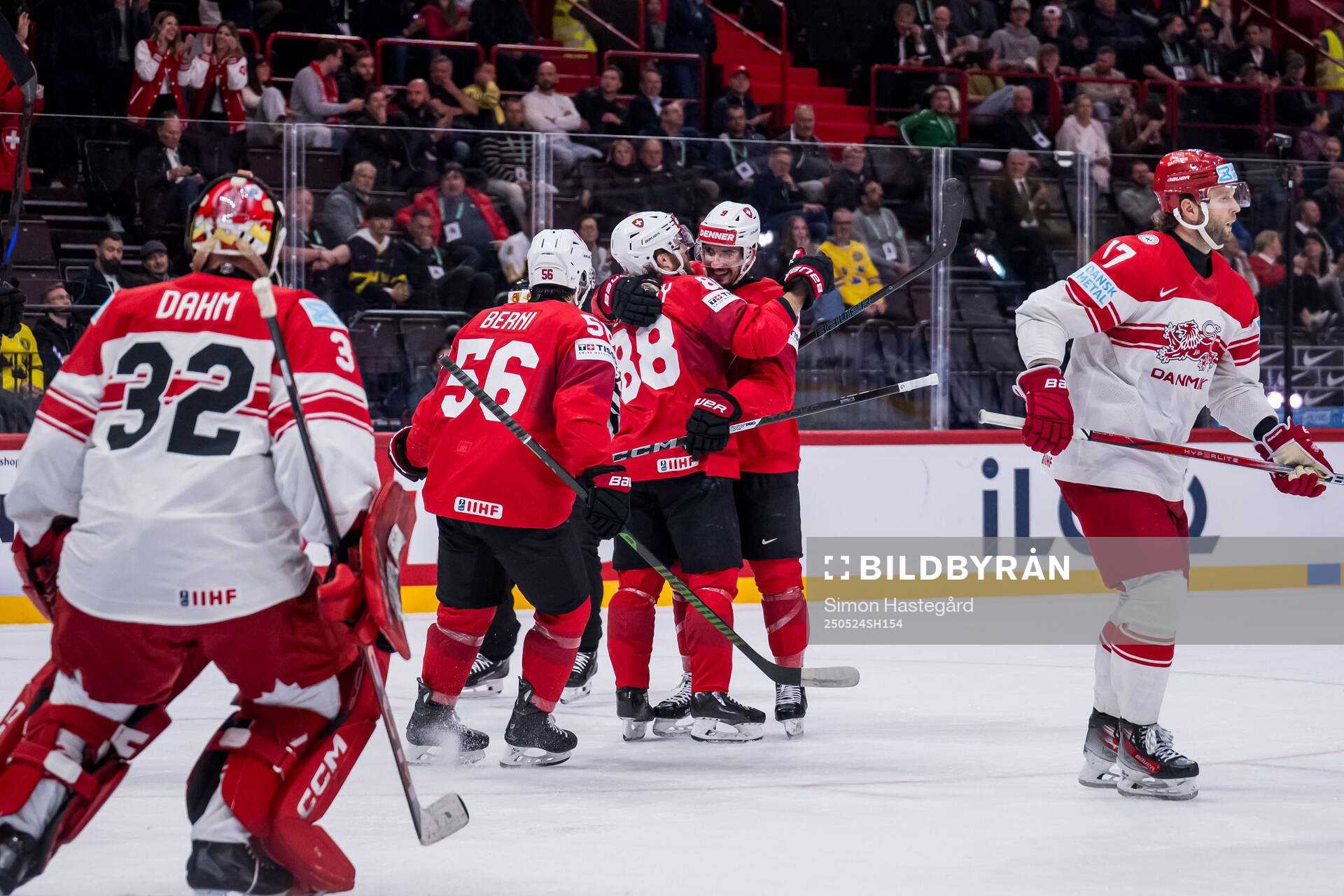 Christoph Bertschy and Damien Riat of Switzerland celebrate
