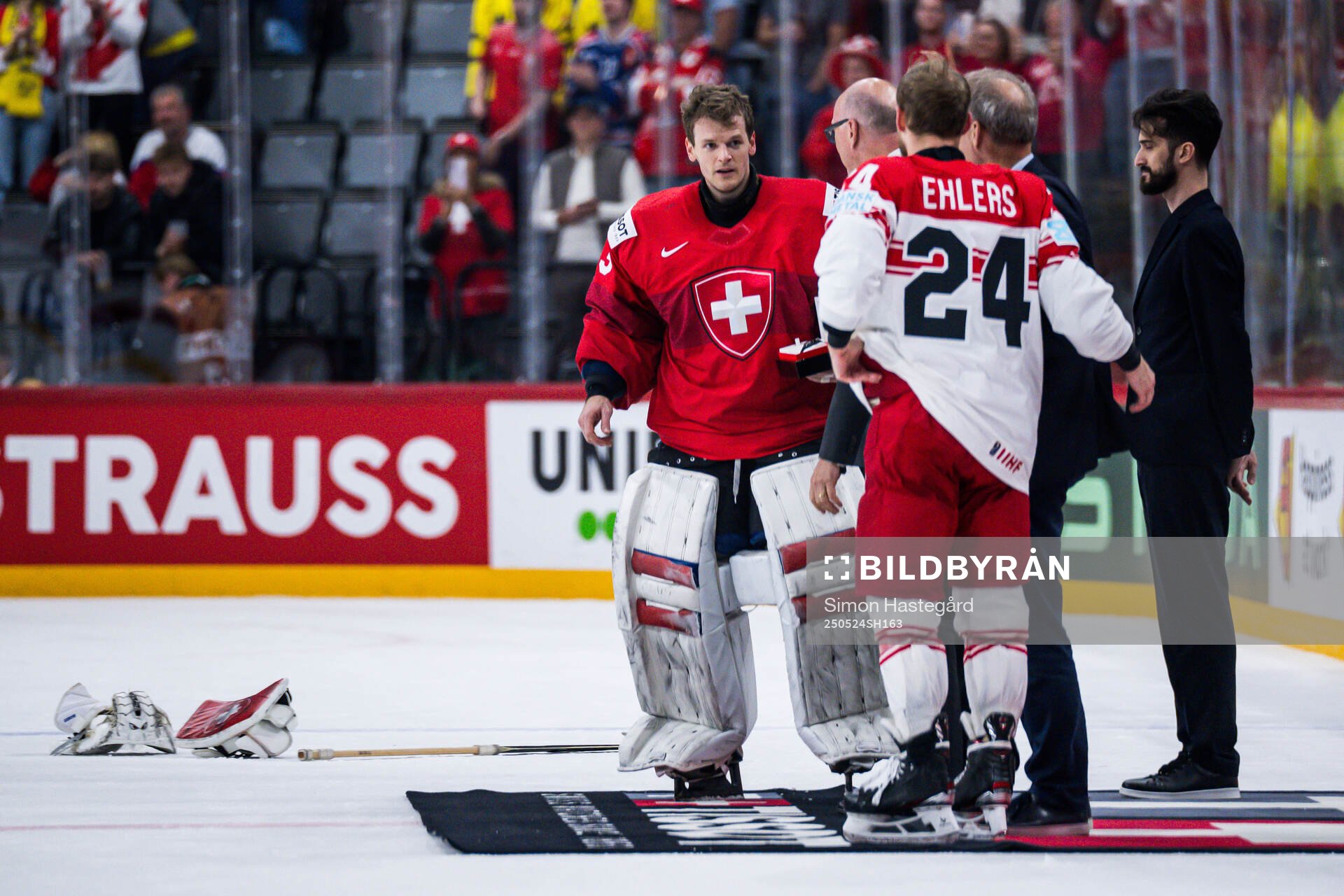 Goaltender Leonardo Genoni of Switzerland and Nikolaj