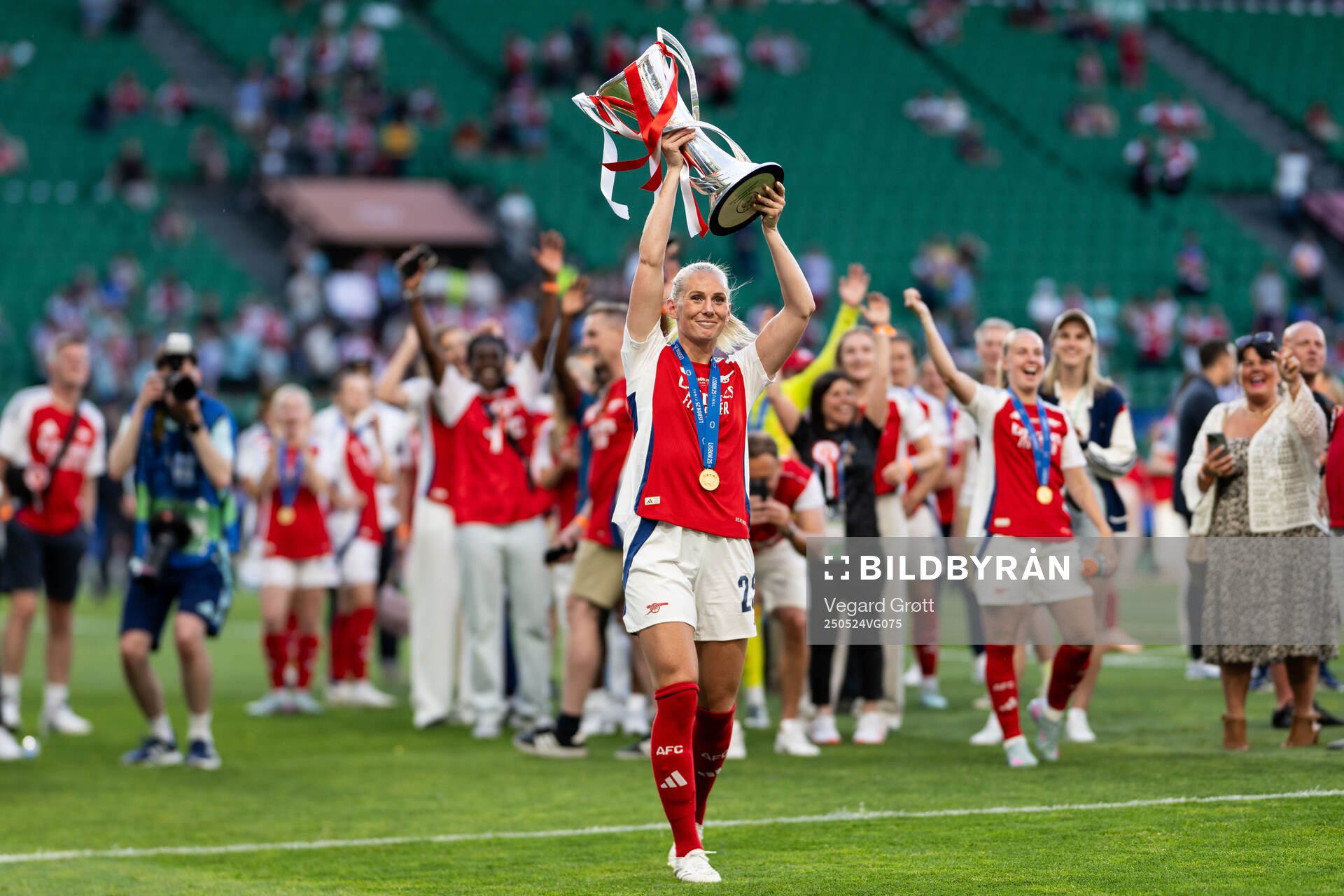 Stina Blackstenius of Arsenal celebrates with the trophy after the UEFA Women's Champions League final match between Arsenal and Barcelona on May 24, 2025 in Lisbon.