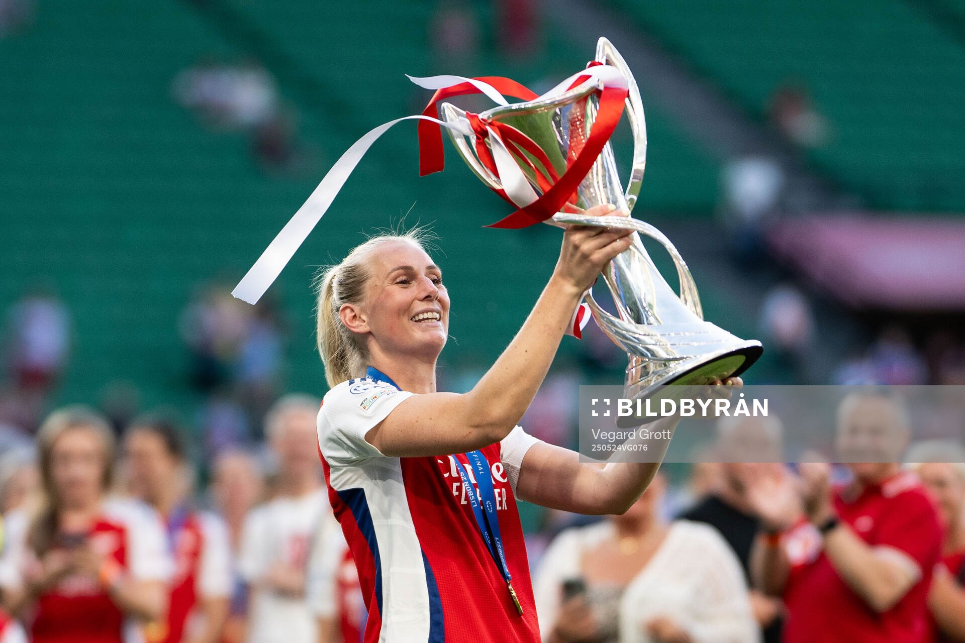 Stina Blackstenius of Arsenal celebrates with the trophy after the UEFA Women's Champions League final match between Arsenal and Barcelona on May 24, 2025 in Lisbon.