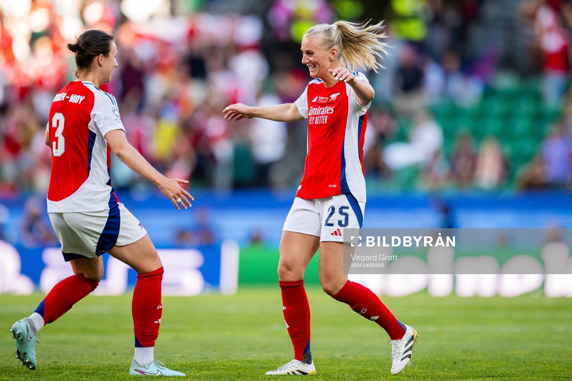 Lotte Wubben-Moy and Stina Blackstenius of Arsenal celebrate after the UEFA Women's Champions League final match between Arsenal and Barcelona on May 24, 2025 in Lisbon.