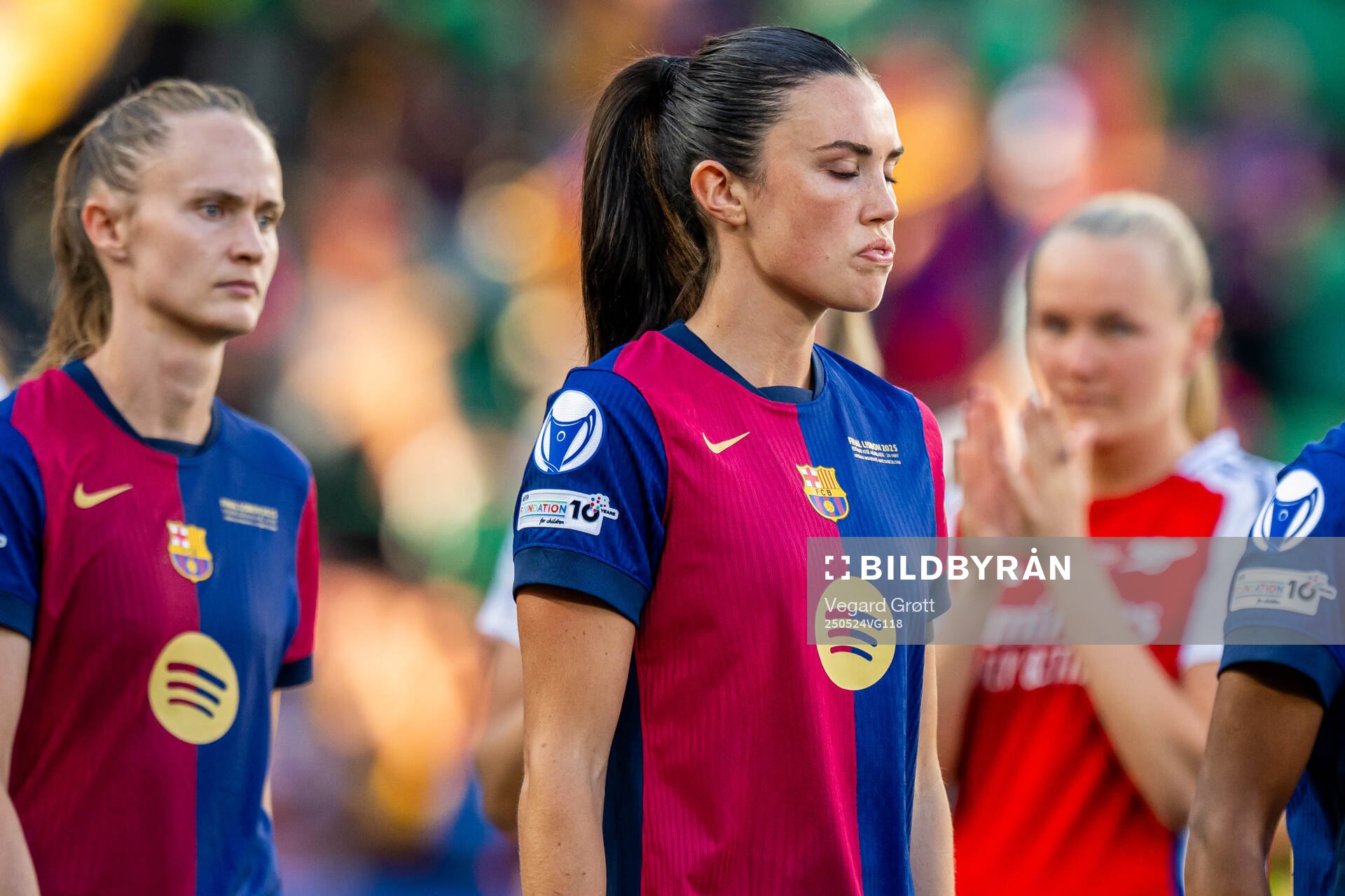 Caroline Graham Hansen of Barcelona, Ingrid Syrstad Engen of Barcelona and Frida Maanum of Arsenal after the UEFA Women's Champions League final match between Arsenal and Barcelona on May 24, 2025 in Lisbon.
