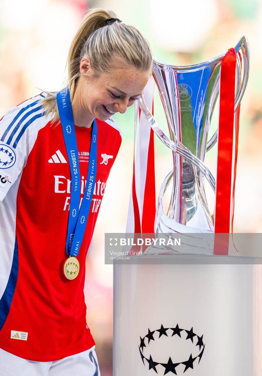 Amanda Ilestedt of Arsenal with the trophy after the UEFA Women's Champions League final match between Arsenal and Barcelona on May 24, 2025 in Lisbon.