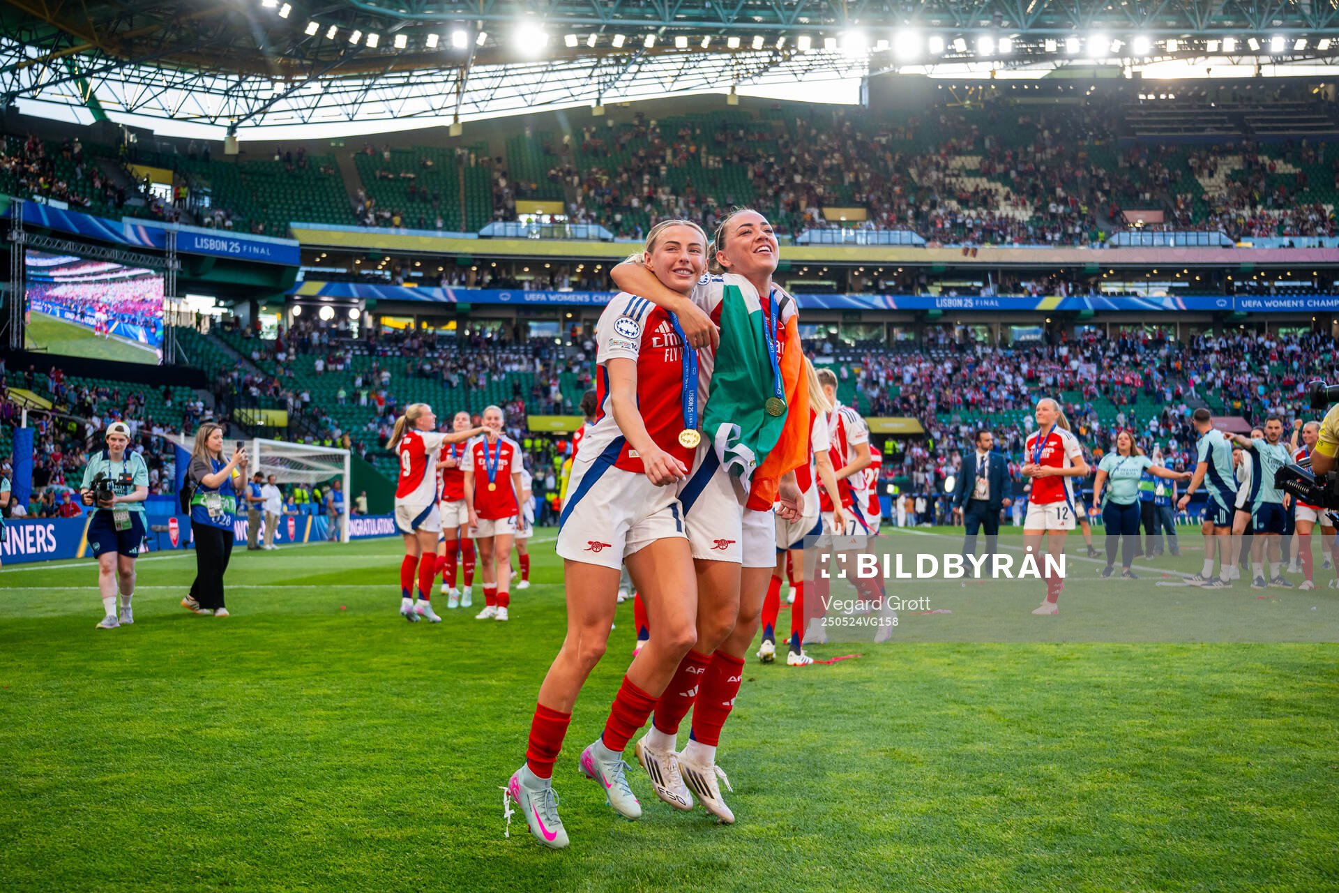 Chloe Kelly and Katie McCabe of Arsenal celebrate after the UEFA Women's Champions League final match between Arsenal and Barcelona on May 24, 2025 in Lisbon.