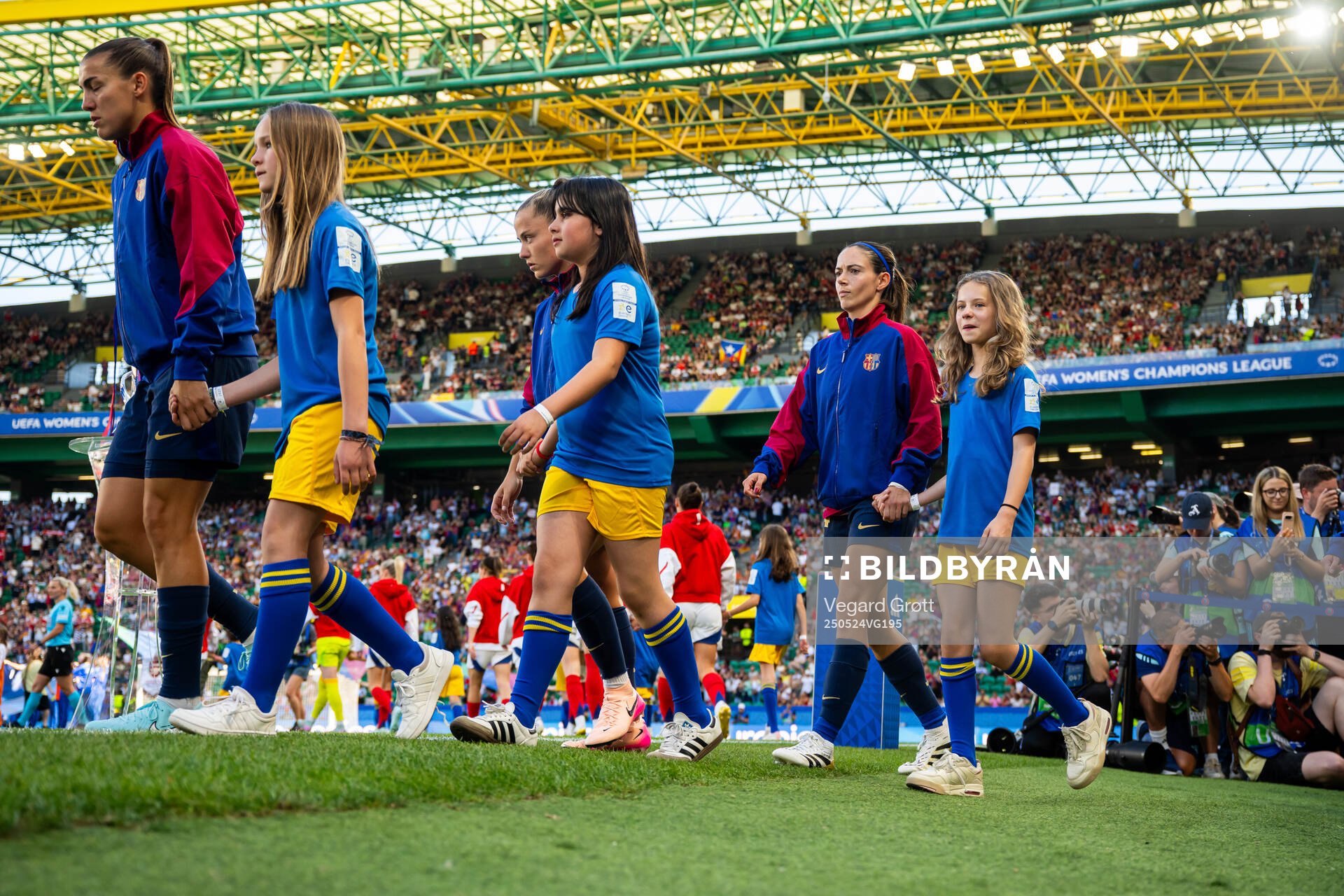 Aitana Bonmati of Barcelona enters the pitch ahead of the UEFA Women's Champions League final match between Arsenal and Barcelona on May 24, 2025 in Lisbon.