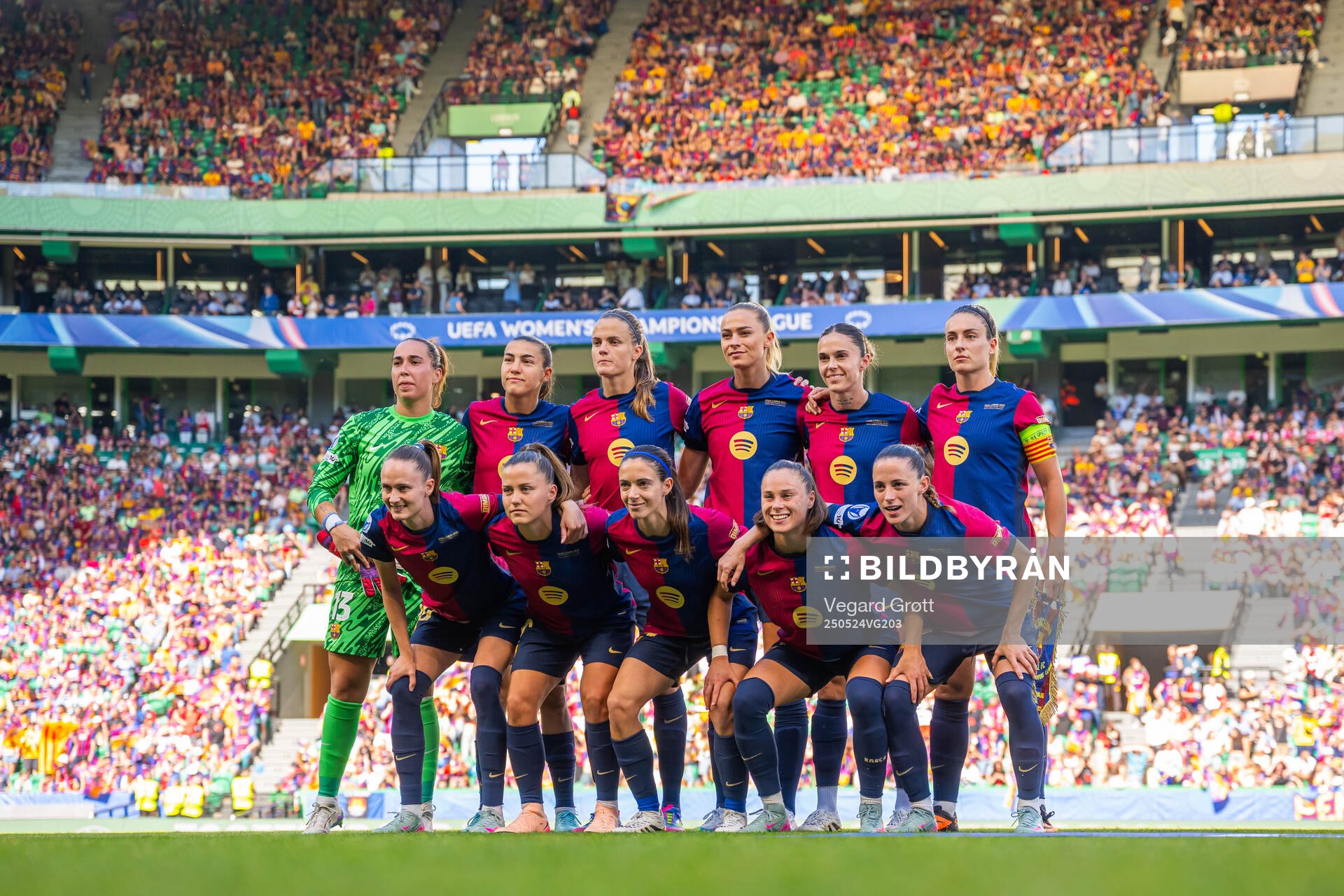 The starting eleven of Barcelona pose for a team photo ahead of the UEFA Women's Champions League final match between Arsenal and Barcelona on May 24, 2025 in Lisbon. Top left: goalkeeper Catalina Coll, Patri Guijarro, Irene Paredes, Fridolina Rolfö, Maria Leon and Alexia Putellas. Front left: Caroline Graham Hansen, Claudia Pina, Aitana Bonmati, Ona Batlle and Ewa Pajor.