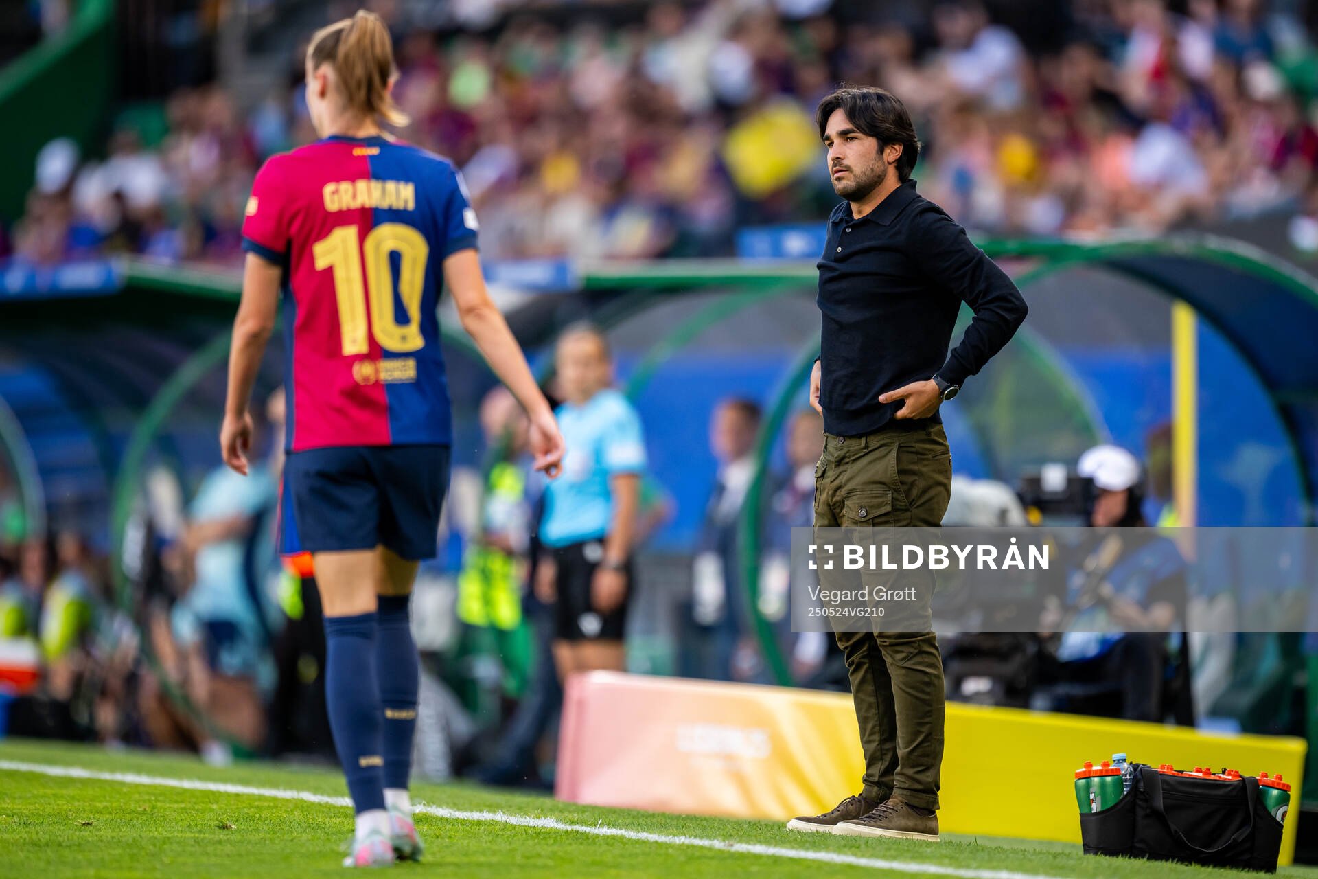 Caroline Graham Hansen and coach Pere Romeu of Barcelona during the UEFA Women's Champions League final match between Arsenal and Barcelona on May 24, 2025 in Lisbon.