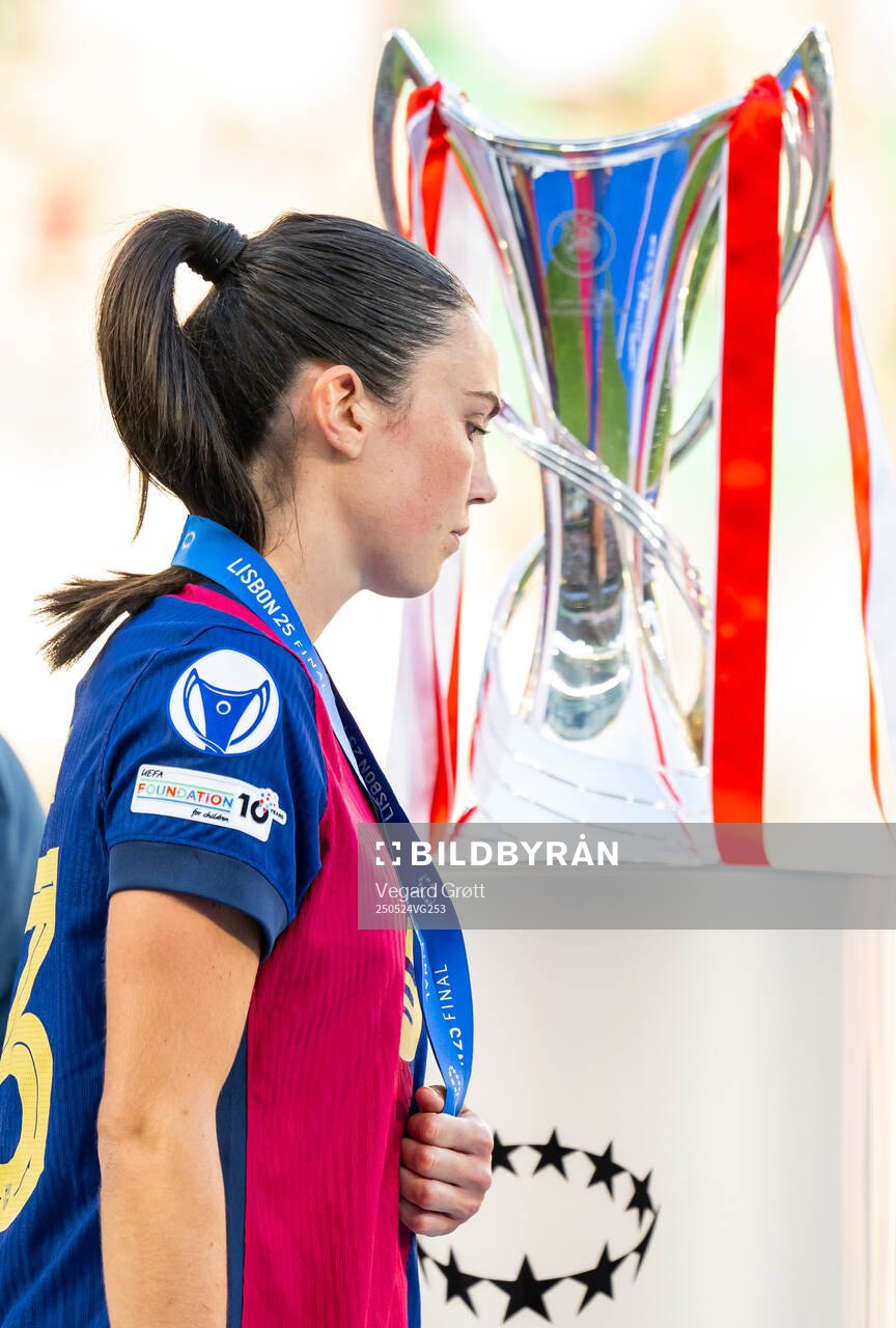 Ingrid Syrstad Engen of Barcelona walks past the trophy after the UEFA Women's Champions League final match between Arsenal and Barcelona on May 24, 2025 in Lisbon.