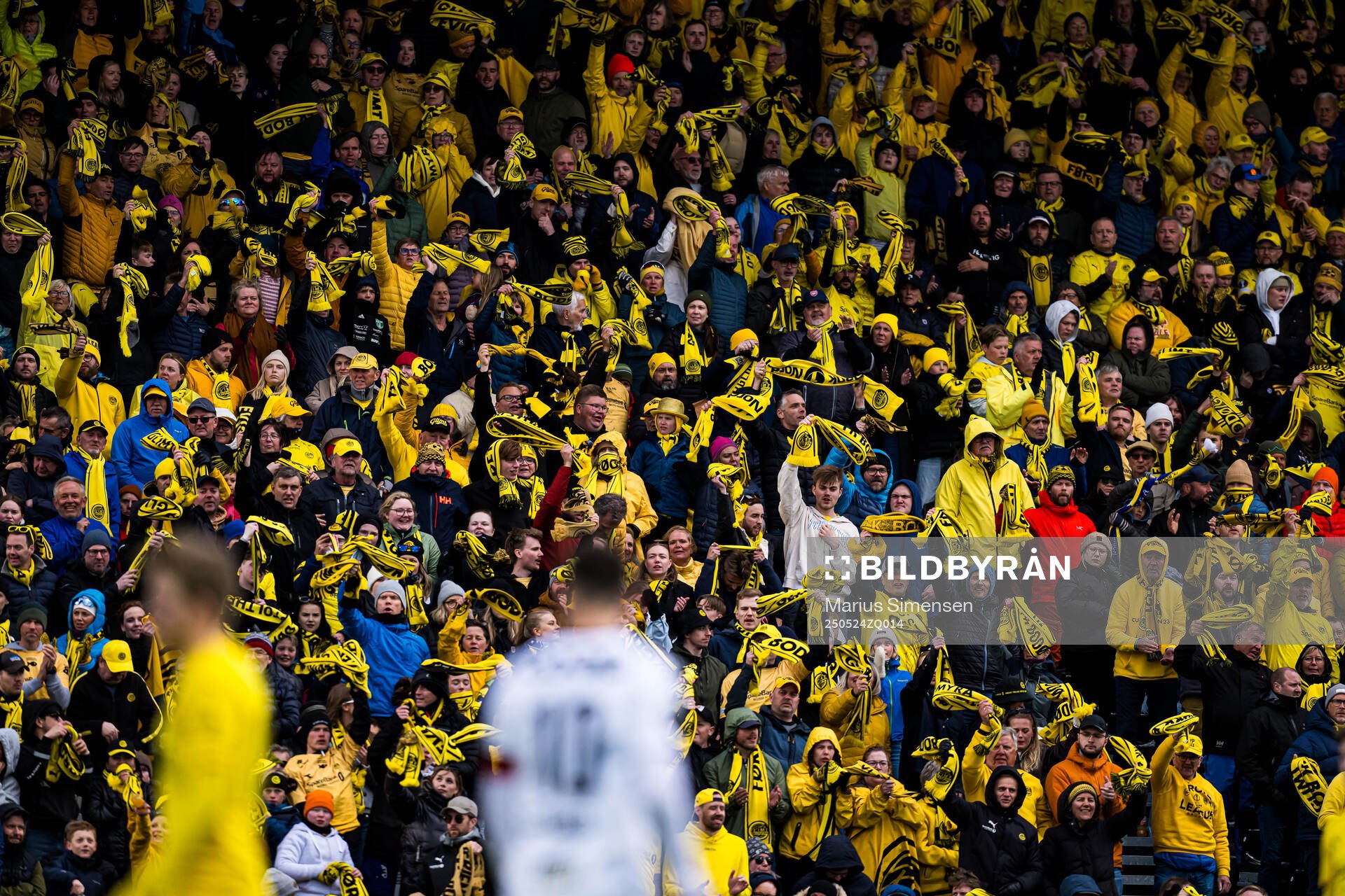 Spectators in the stands during the Eliteserien match between Bodø/Glimt and Rosenborg on May 24, 2025 in Bodø.