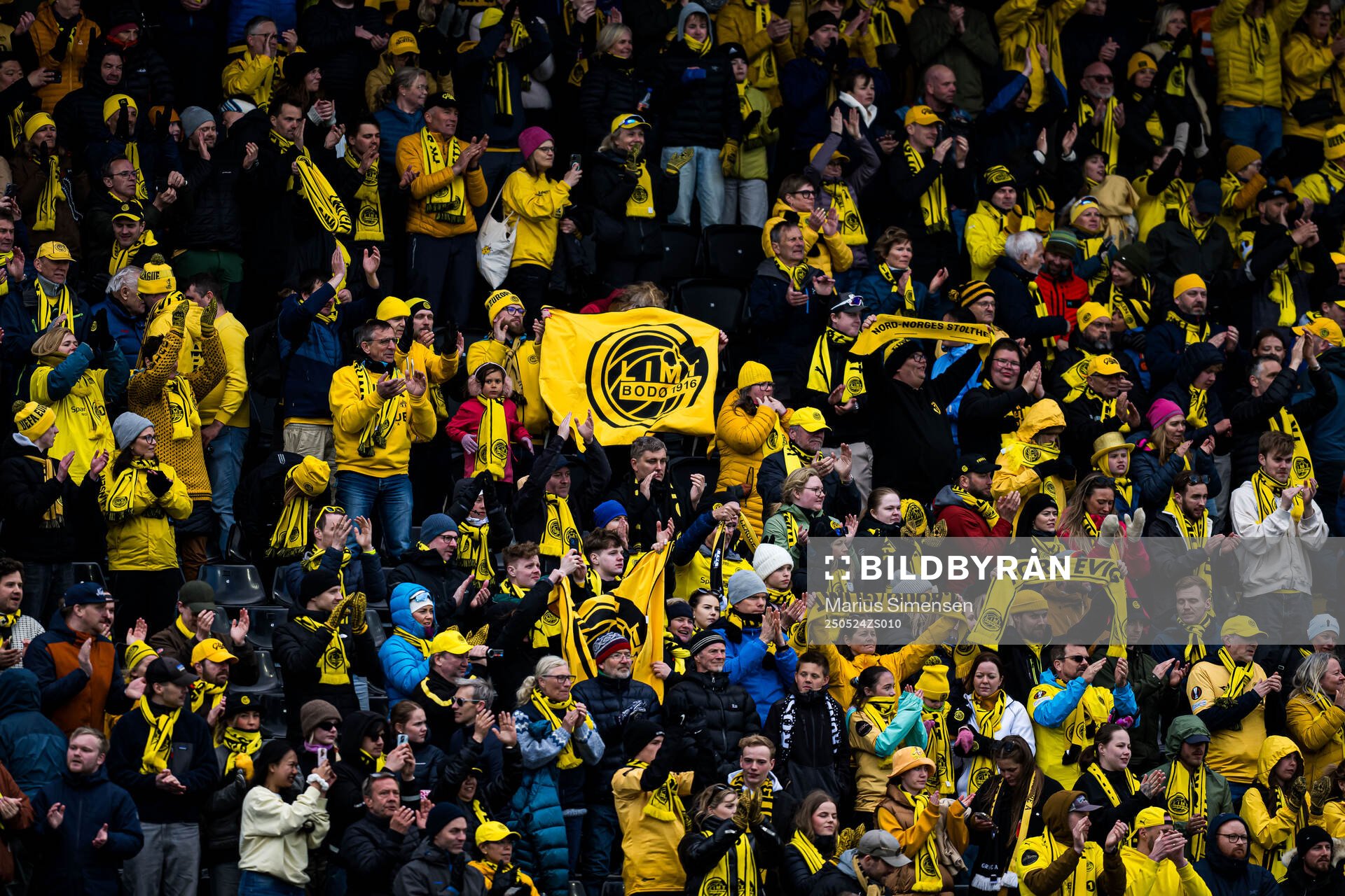 Spectators in the stands during the Eliteserien match between Bodø/Glimt and Rosenborg on May 24, 2025 in Bodø.