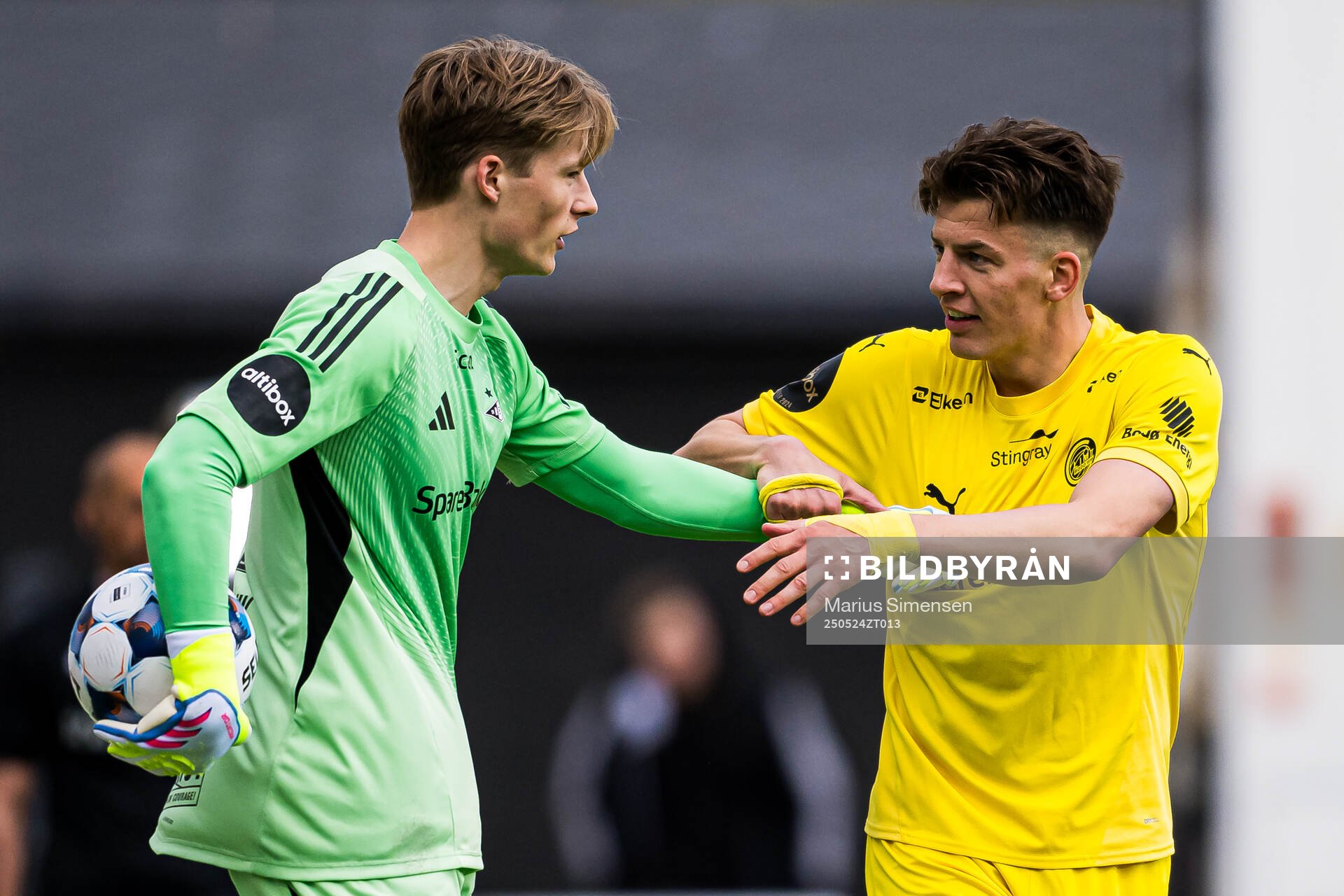 Sander Tangvik of Rosenborg and Jostein Gundersen of Bodø/Glimt during the Eliteserien match between Bodø/Glimt and Rosenborg on May 24, 2025 in Bodø.