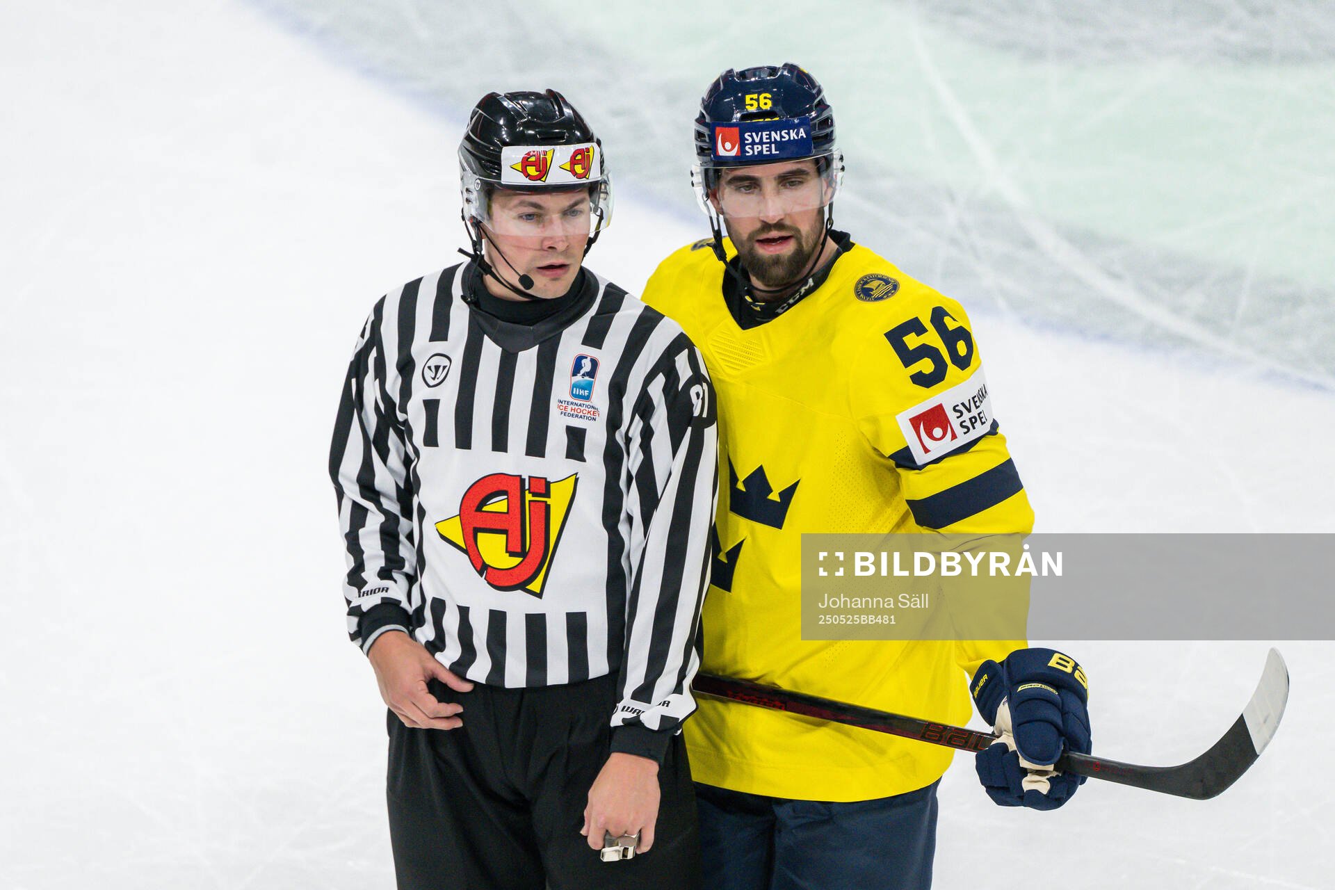 Erik Gustafsson of Sweden with linesman Shane Gustafson