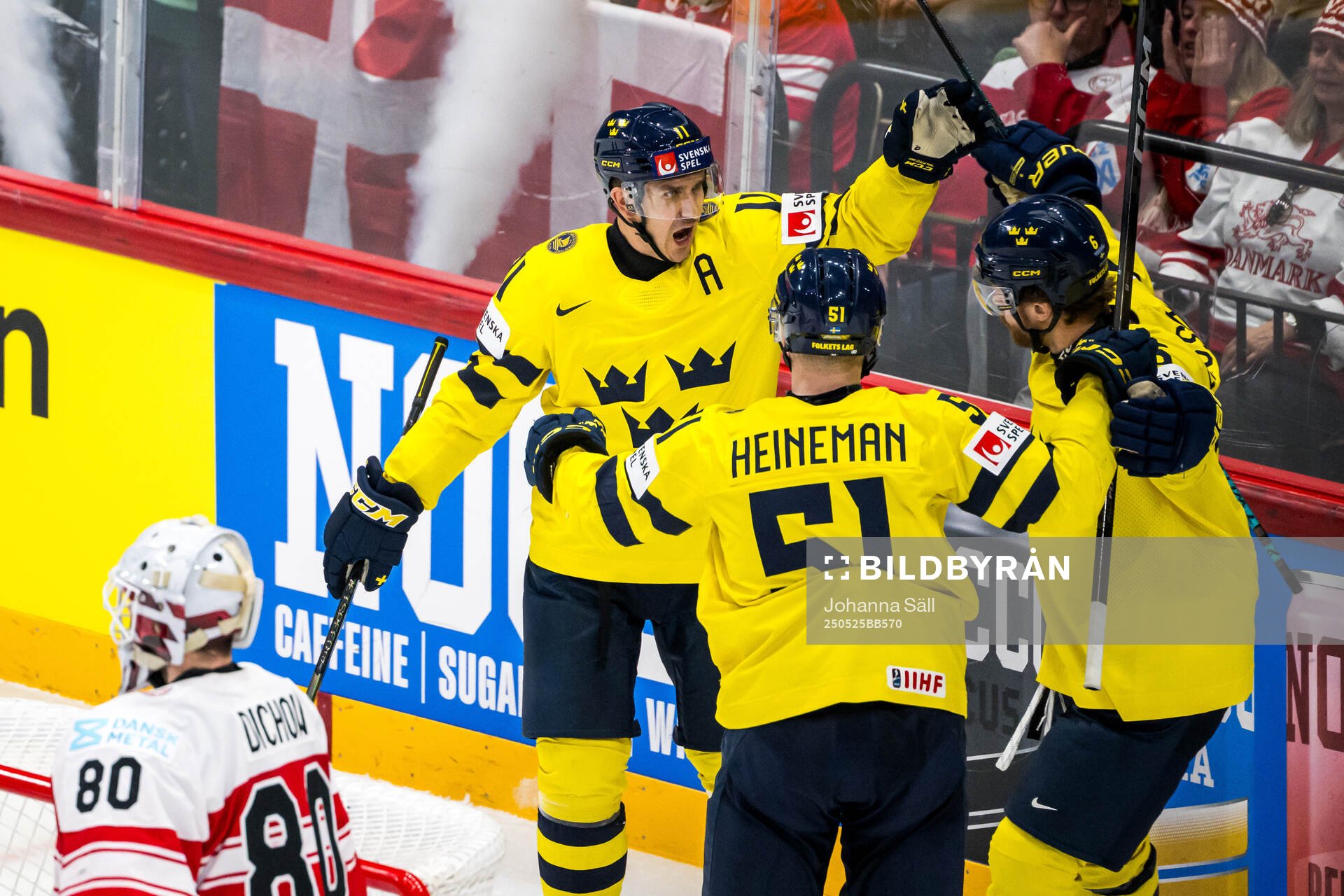 Mikael Backlund celebrates with Emil Heineman and Adam
