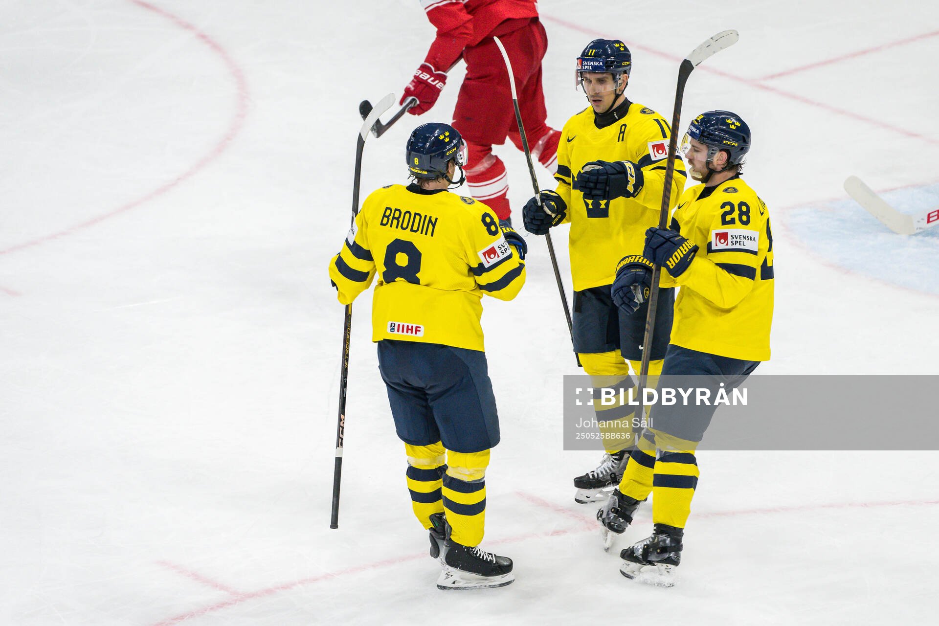 Mikael Backlund of Sweden celebrates with Jonas Brodin and