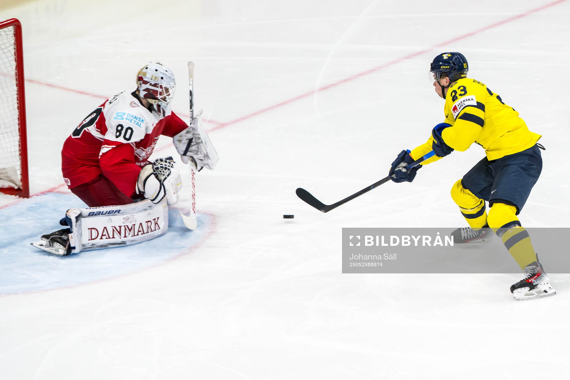 Lucas Raymond of Sweden scores 4-0 past goaltender Frederik