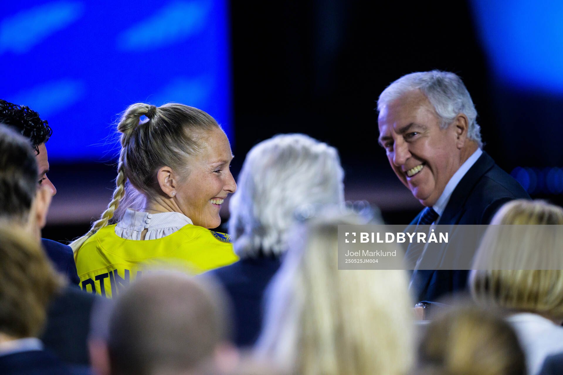 Kim Martin-Hasson of Sweden and IIHF president Luc Tardif