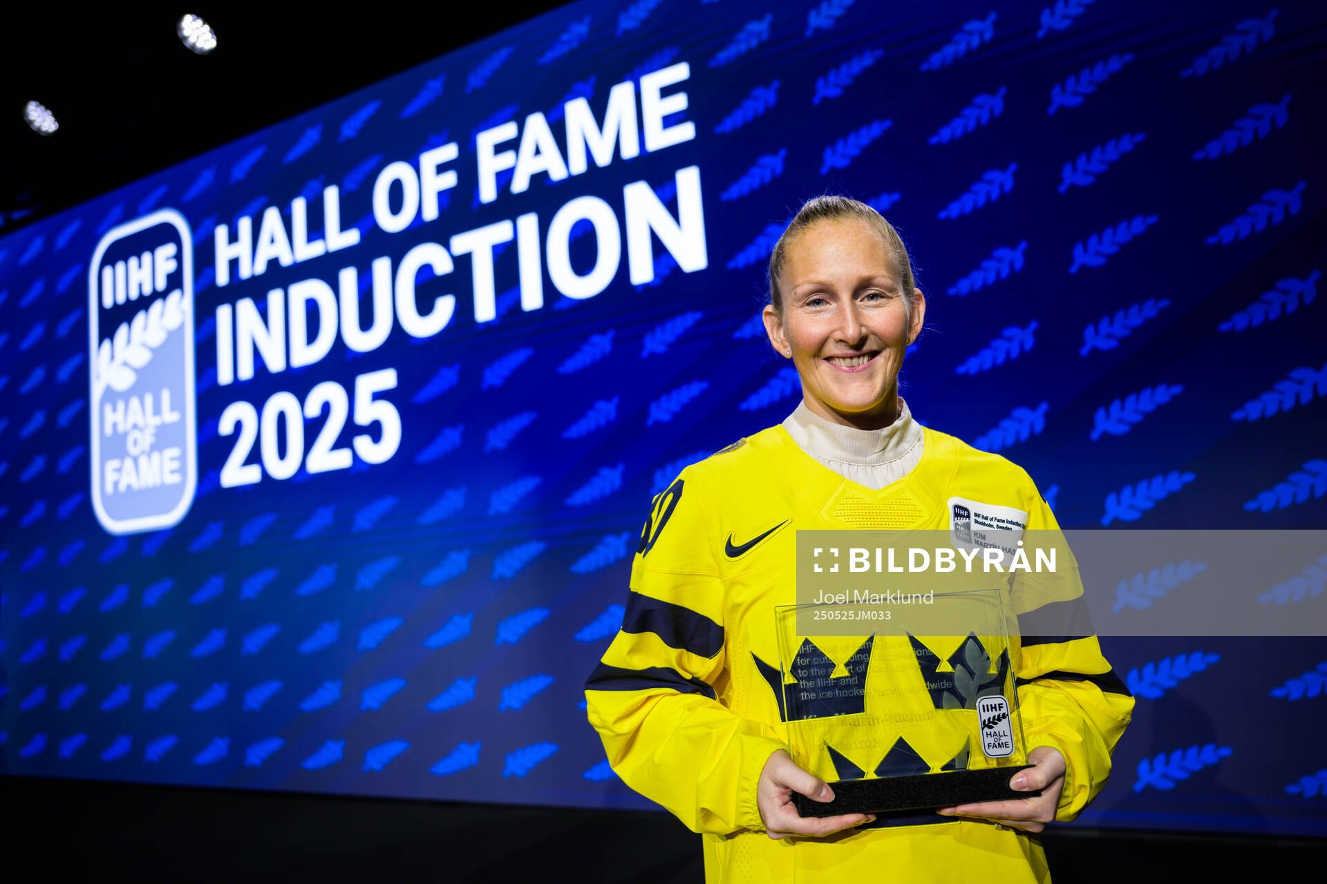 Kim Martin-Hasson of Sweden poses with her induction trophy