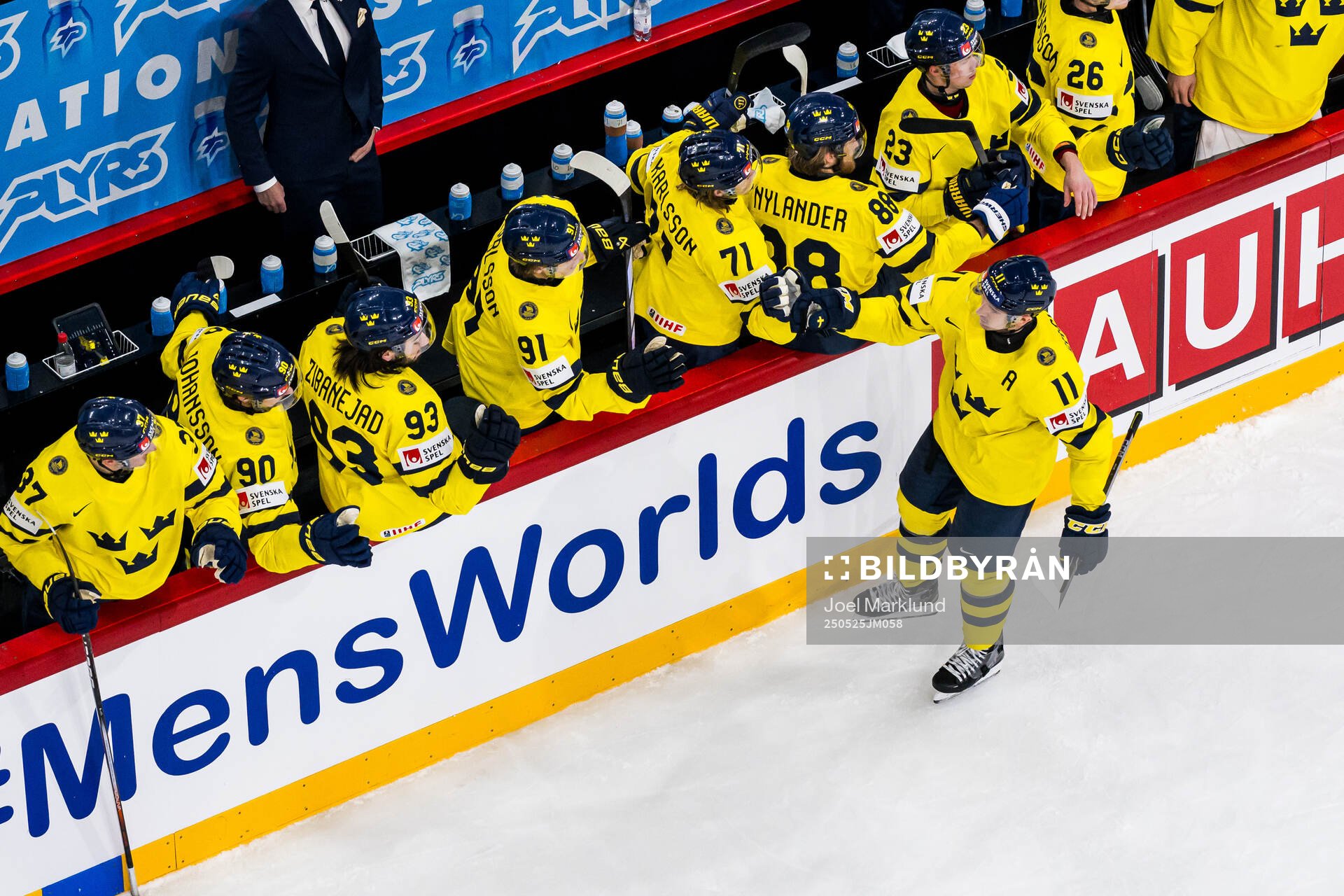 Mikael Backlund of Sweden celebrates with team mates