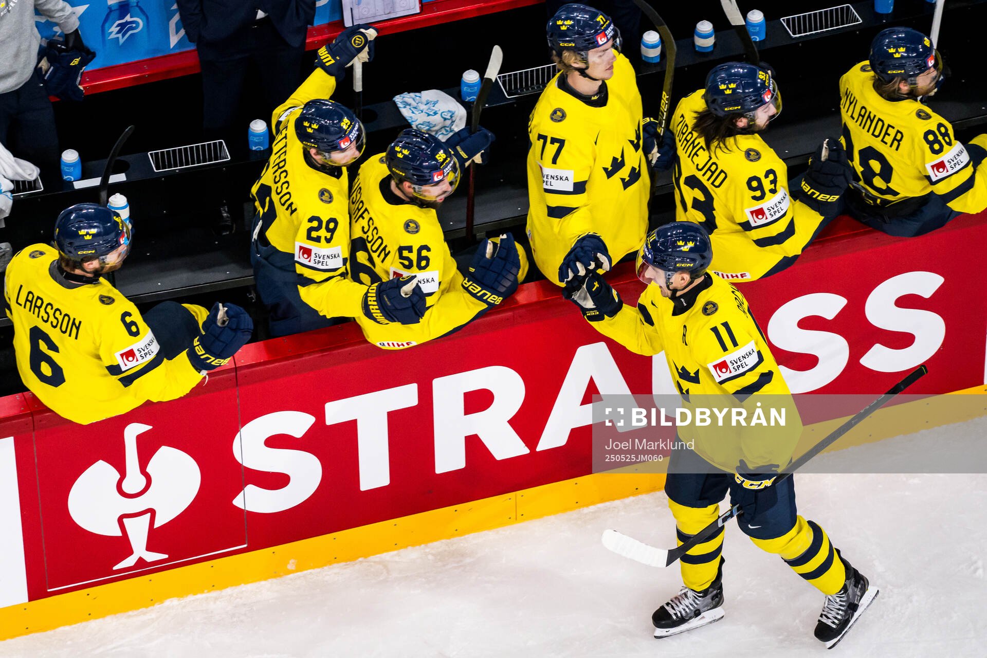 Mikael Backlund of Sweden celebrates with Adam Larsson,