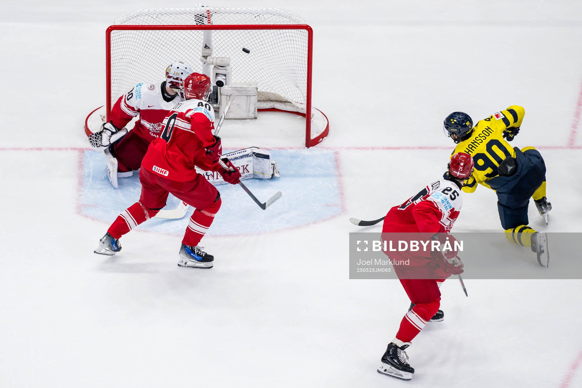 Marcus Johansson of Sweden scores 3-0 past Anders Koch and