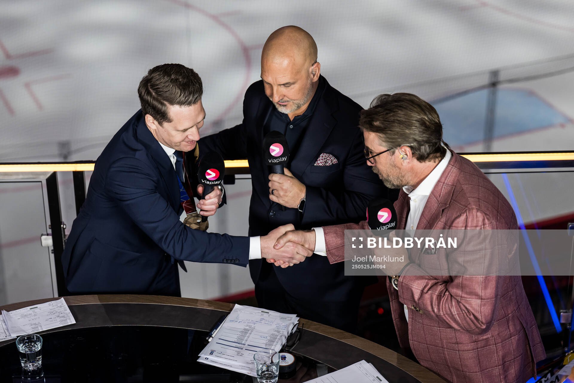 Head coach Sam Hallam of Sweden shake hands with Peter