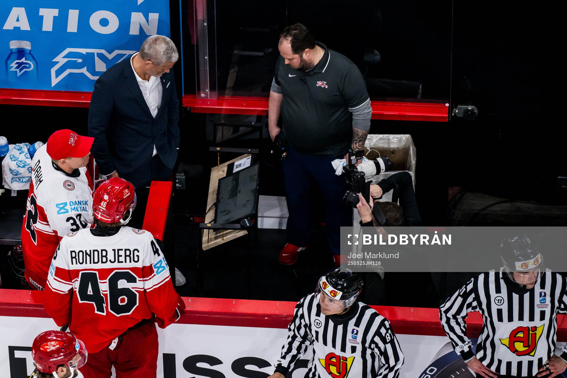 Head coach Mikael Gath of Denmark looks at a screen when a