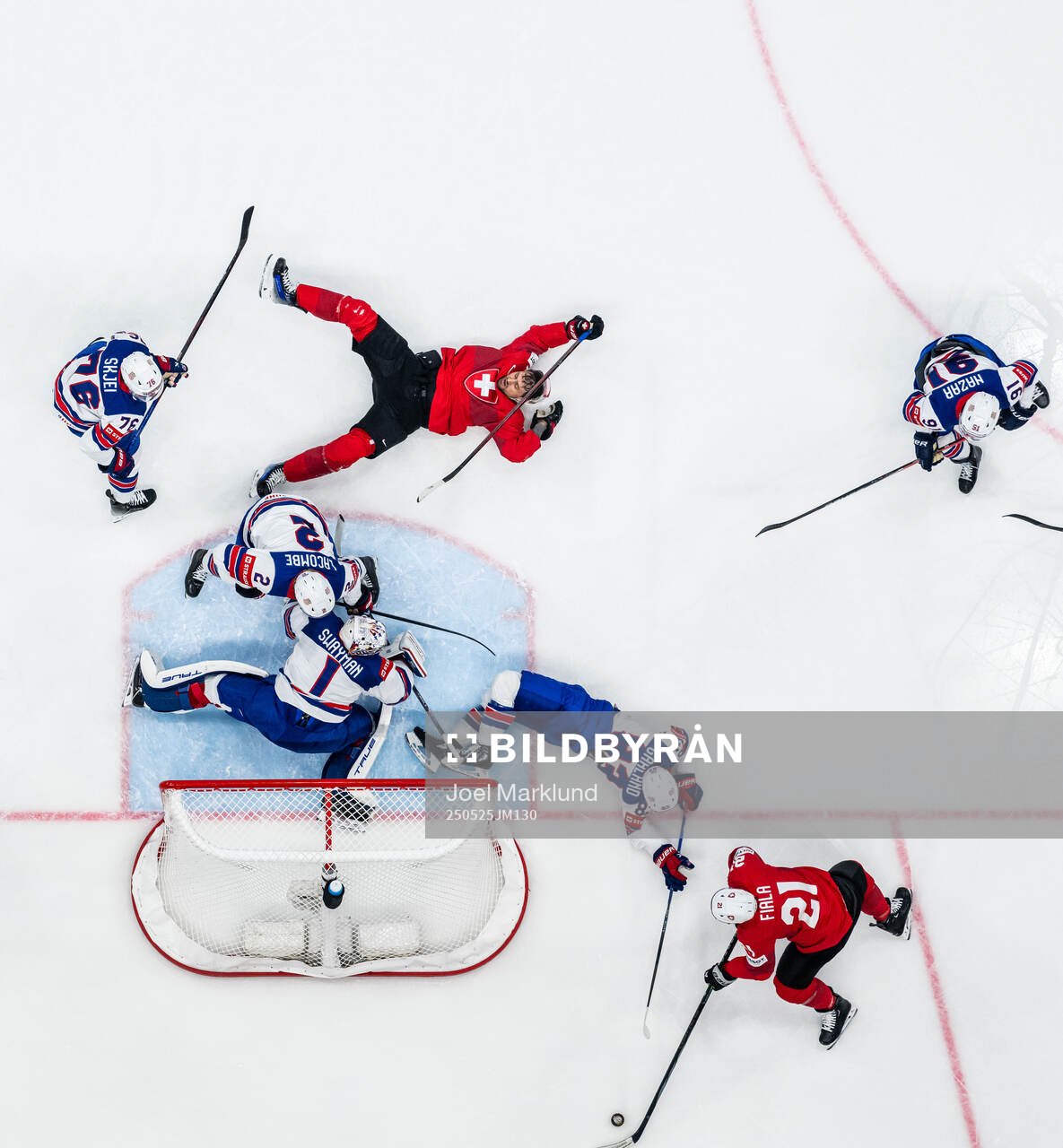 Nino Niederreiter and Kevin Fiala of Switzerland in action