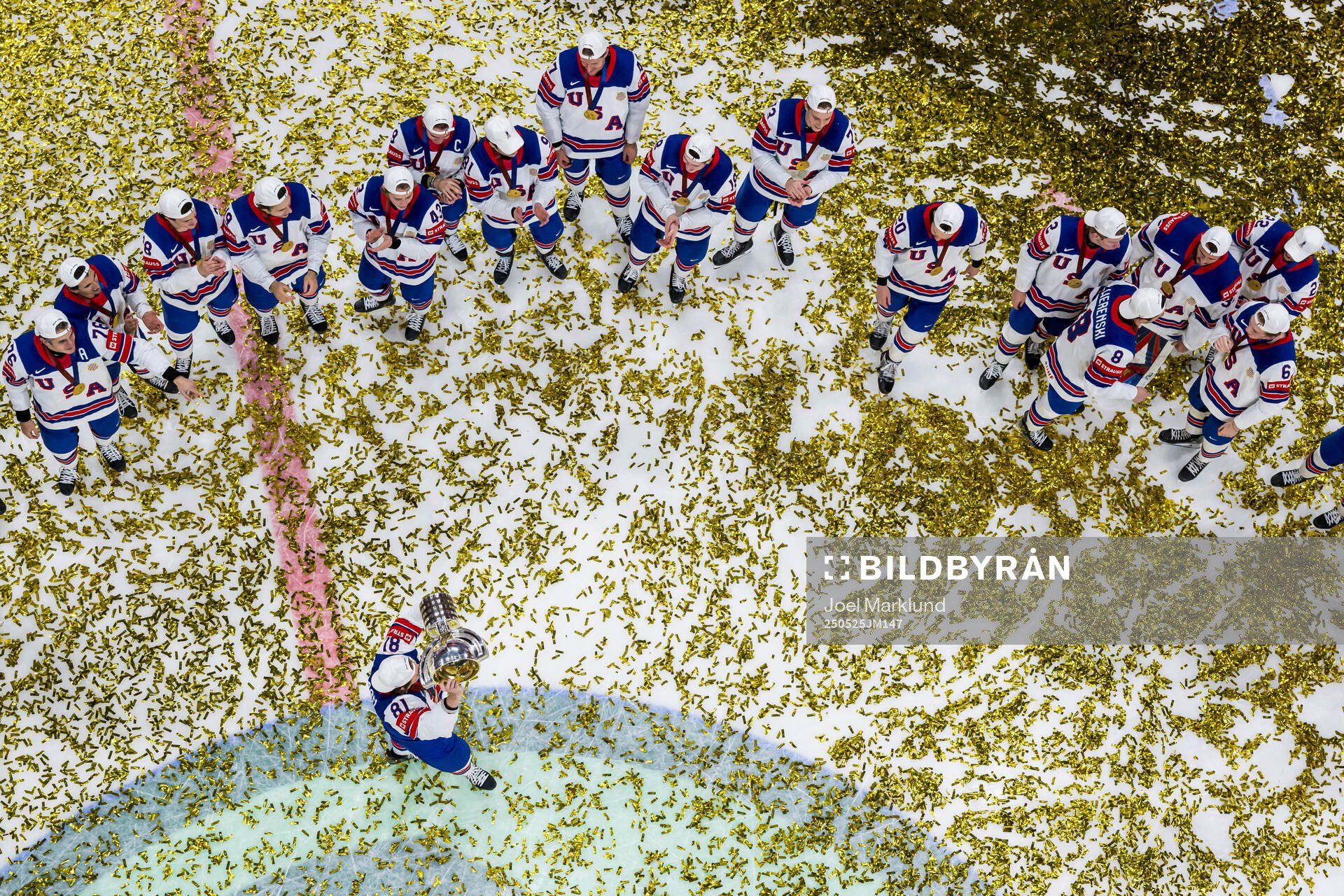 Josh Doan of USA celebrates with the trophy in front of