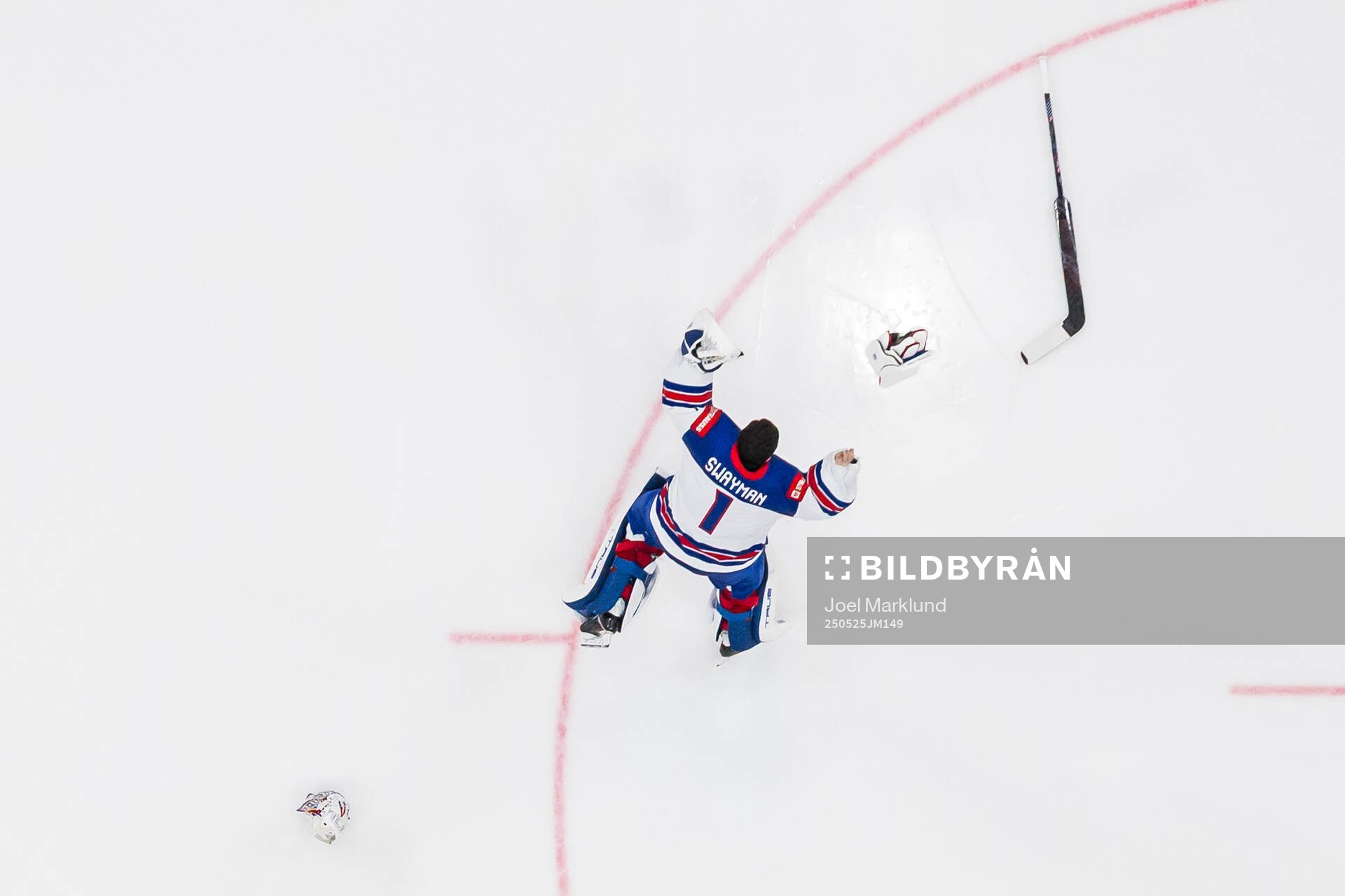 goaltender Jeremy Swayman of USA celebrates