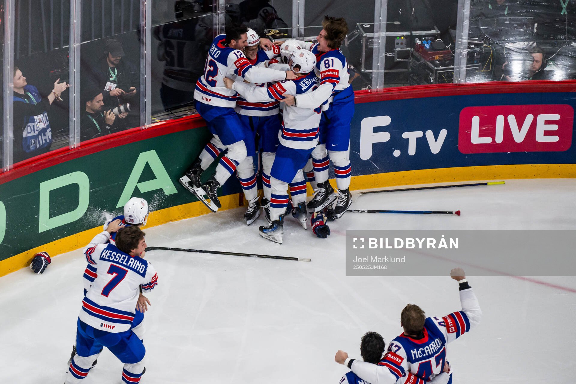 Tage Thompson of USA celebrates with team mates