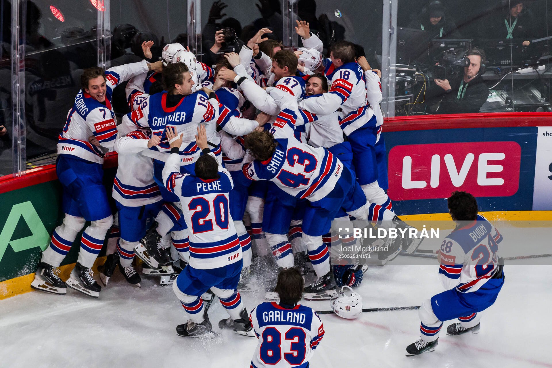 Tage Thompson of USA celebrates with team mates