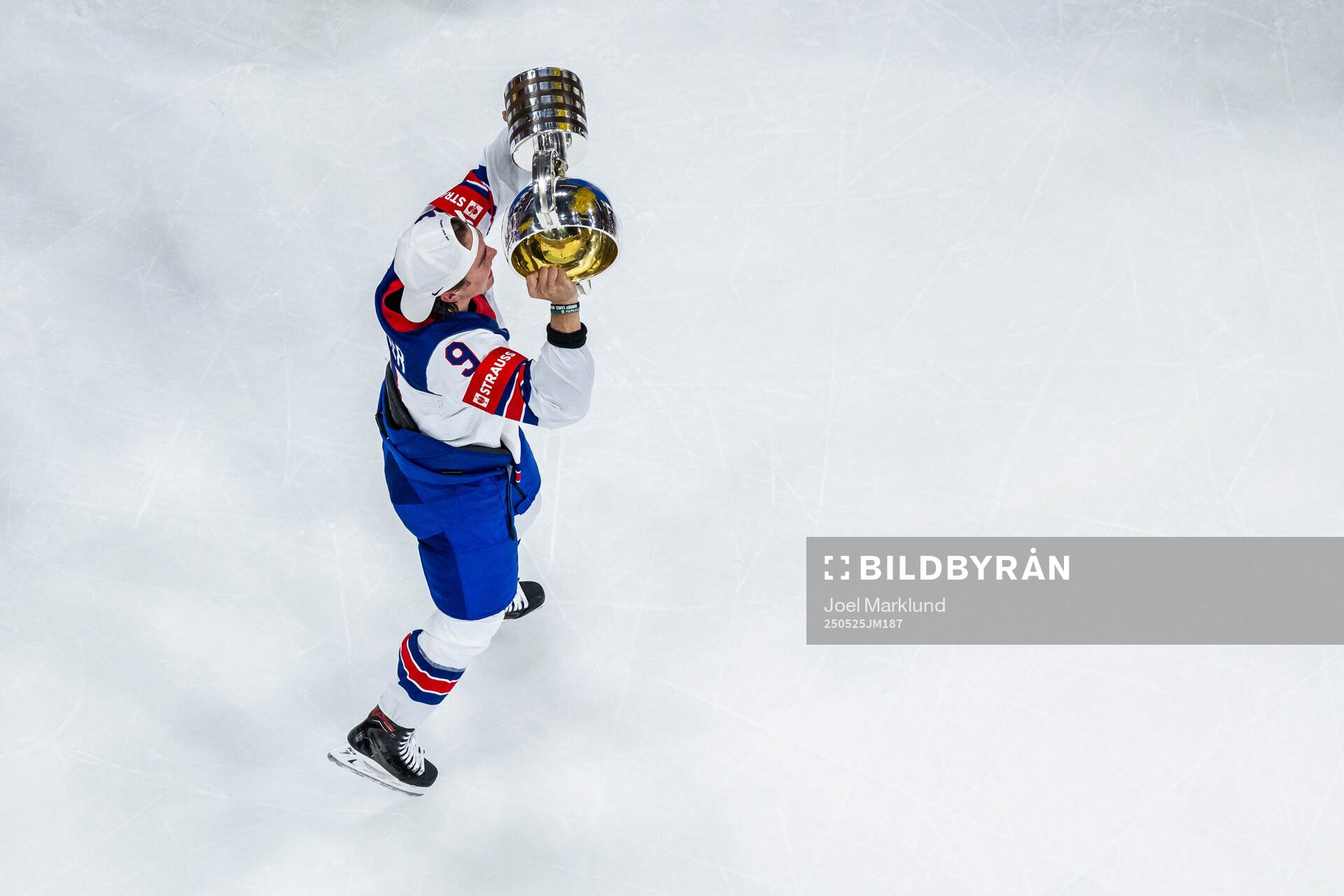 Clayton Keller of USA hoists the winner’s trophy