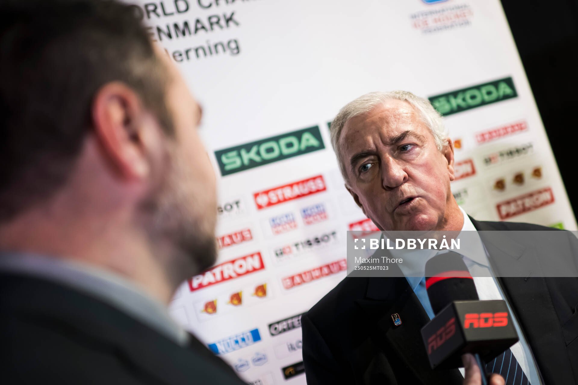 Luc Tardif, IIHF President, is interviewed by members of