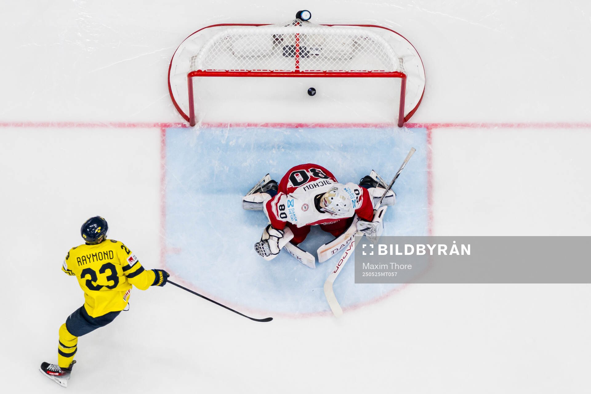 Lucas Raymond of Sweden scores 4-0 past goaltender Frederik