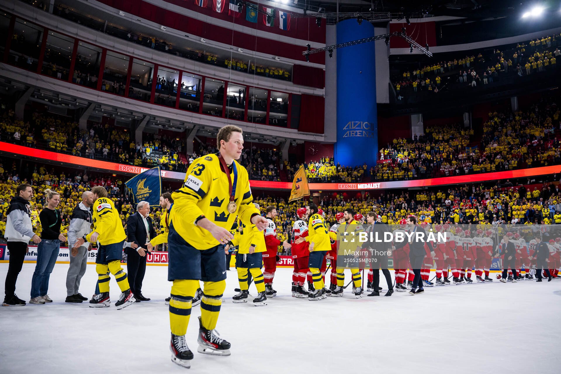 Mika Zibanejad and Erik Gustafsson of Sweden greets players