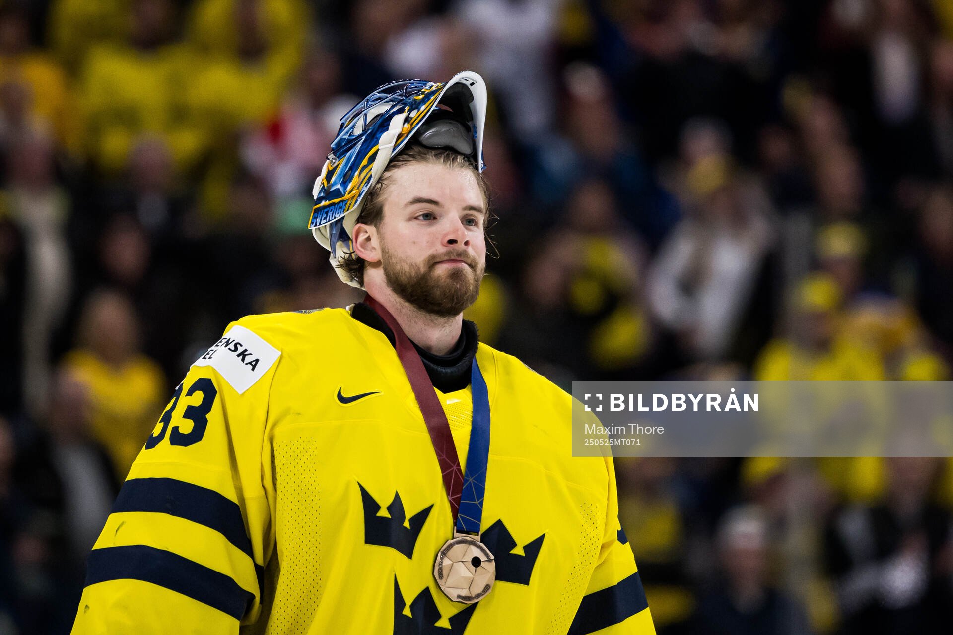 goaltender Samuel Ersson of Sweden with his bronze medal