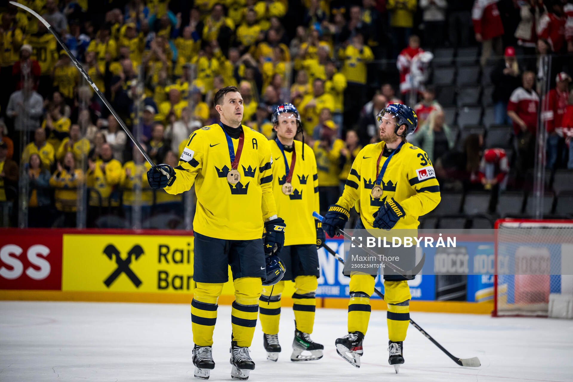 Mikael Backlund and Rasmus Sandin of Sweden recognizes the
